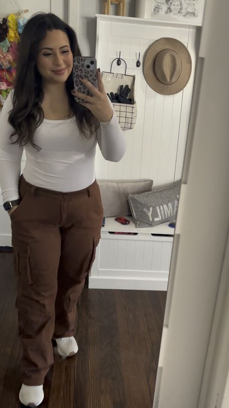 Easy Mommy Fit. 
I love these cargo pants! I had some like this in high school and I wore them to death! I’m a size medium and this white top I wear with everything it’s buttery soft! 

#LTKfindsunder50 #LTKstyletip #LTKmidsize