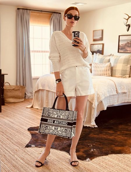 But make it beachy 📸

I turned this office look into a vacation ready set by removing the belt and adding this fun bag. 

Quiet luxury is all about quality pieces that last and mix and match into your wardrobe. This sweater and linen shorts do just that and make a simple look very elegant. 

#LTKWorkwear #LTKOver40 #LTKU