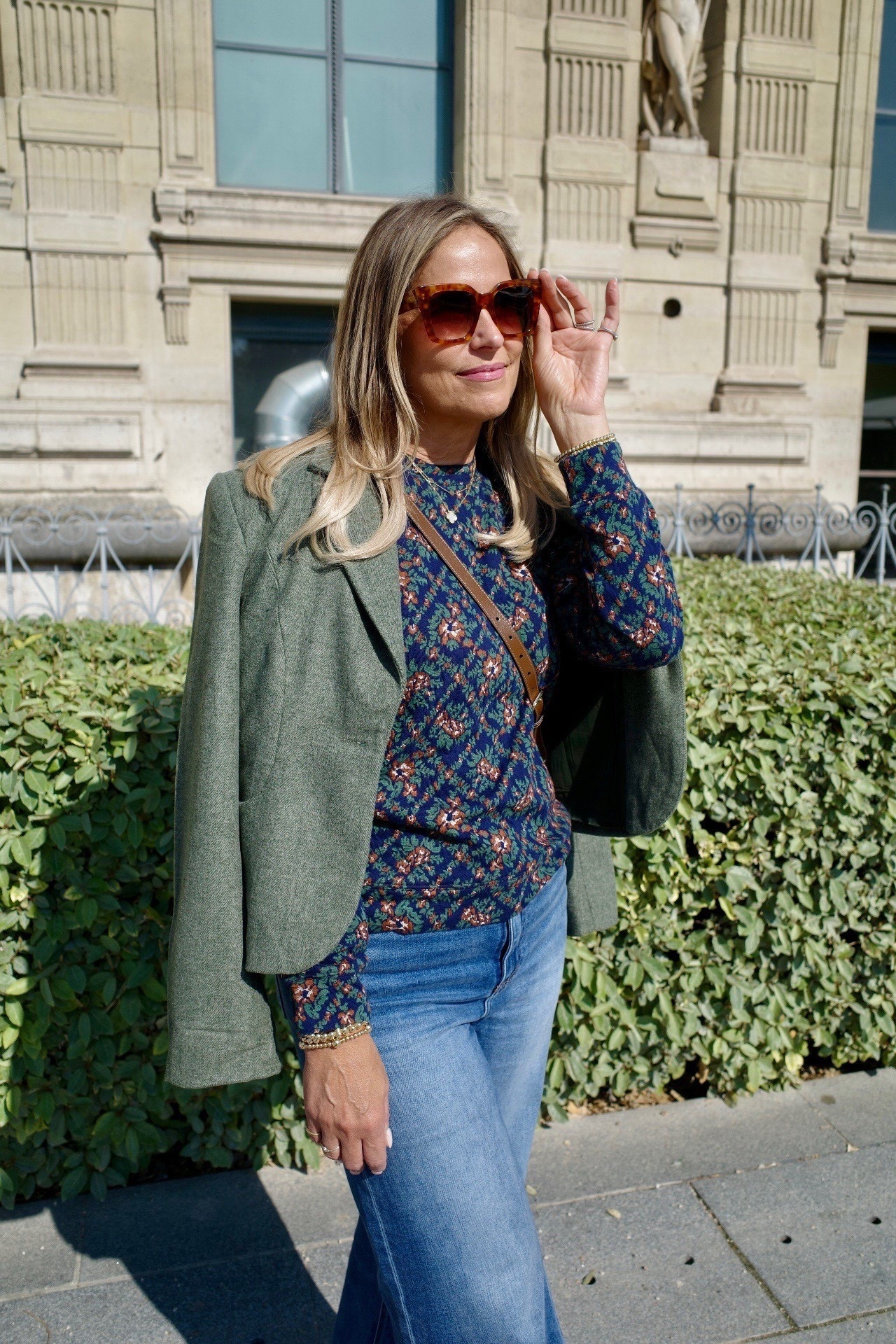 We are loving this green blazer layered over a floral blouse for fall. Paired with wide leg denim and classic accessories, it’s such an easy outfit formula. Perfect look for transitioning into cooler weather. 

#LTKMidsize #LTKSeasonal #LTKOver40