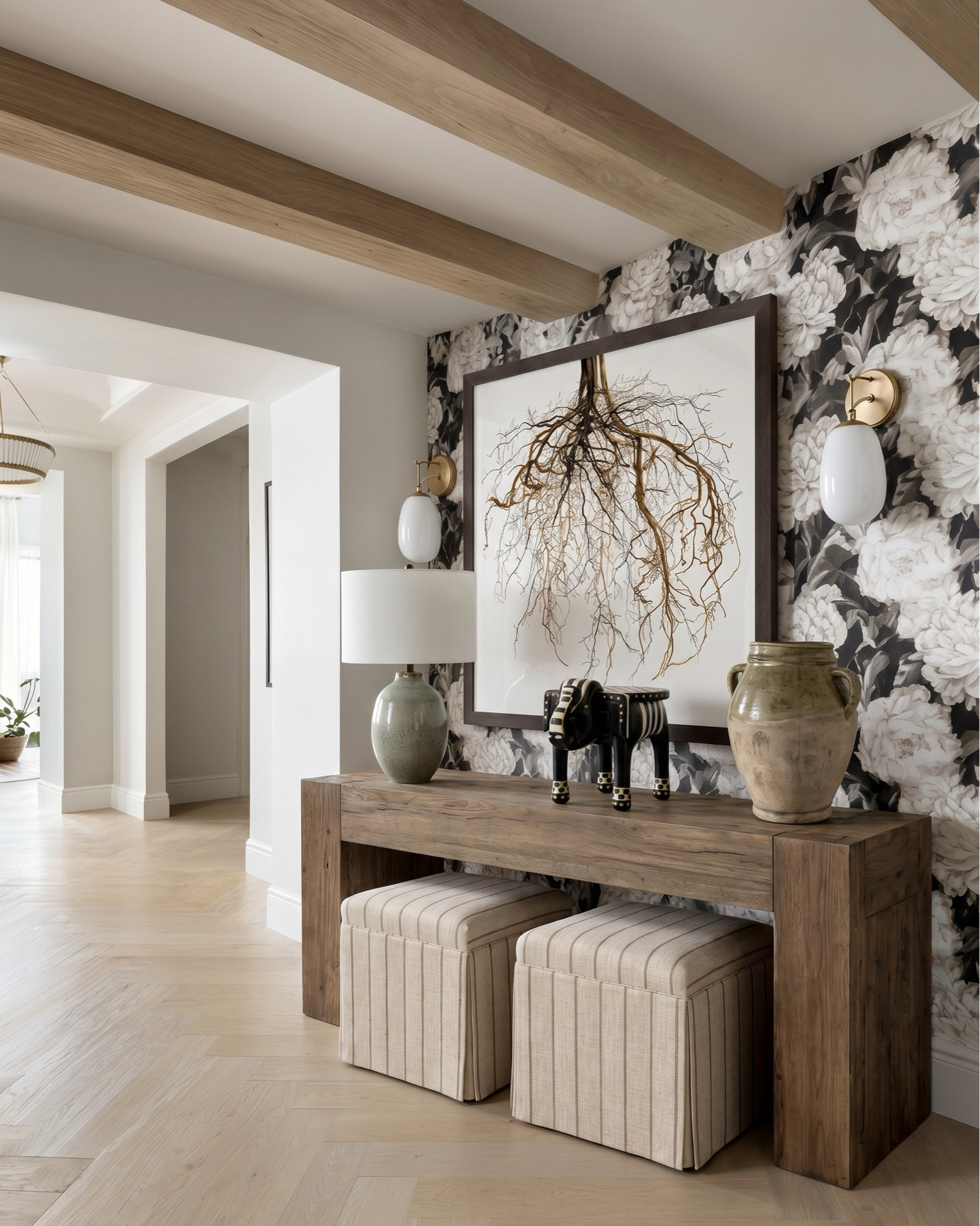 From a dramatic black and white checkered marble entryway to a warm dark wood kitchen, every detail in this home blends classic architecture with modern organic design.
Shop the look featuring:
• Checkered marble floor tile • Natural stone wall cladding • Rustic wood console table • Woven cube ottomans • Large abstract neutral wall art • Black chandelier with linen shades • Brass wall sconces • Oversized ceramic vase • Marble table lamps • White orchid arrangement
Living Room: • Curved ivory sofa • Bouclé accent chair • Fluted wood coffee table • Marble fireplace surround • Arched built-in bookshelves • Brass wall sconces • Neutral abstract artwork • Vintage-inspired brown area rug • Decorative ceramic vases • Coffee table books
Bedroom: • Scenic toile wallpaper mural • Dark wood upholstered bed • Linen bedding set • Velvet accent pillow • Fluted nightstand • Marble table lamp • Textured ceramic vase • Decorative wall mirror
Kitchen: • Marble waterfall island • Marble backsplash • White upholstered counter stools • Marble pendant lights
• Skirted ottomans 
• Scalloped mirrors • Ceramic flower vase • Marble candle holders

#LTKsale #LTKhome #LTKstyletip