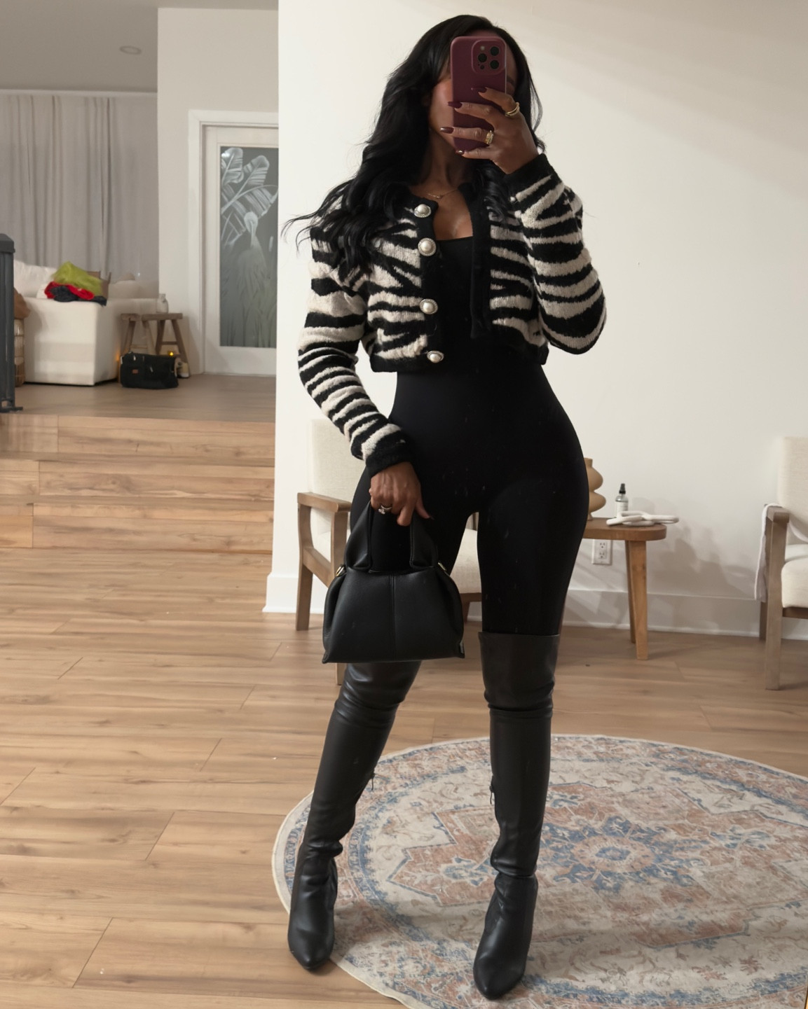 Out to dinner outfit 🖤 my favorite jumpsuit with this luxe sweater dumpling inspired bag and knee high boots 

|•Size small I’m 5’4 | 140lbs | 36D -27 -40  IG & YT: kirasfashionfinds TT: kiraabboud•|

#LTKStyleTip #LTKShoeCrush #LTKItBag