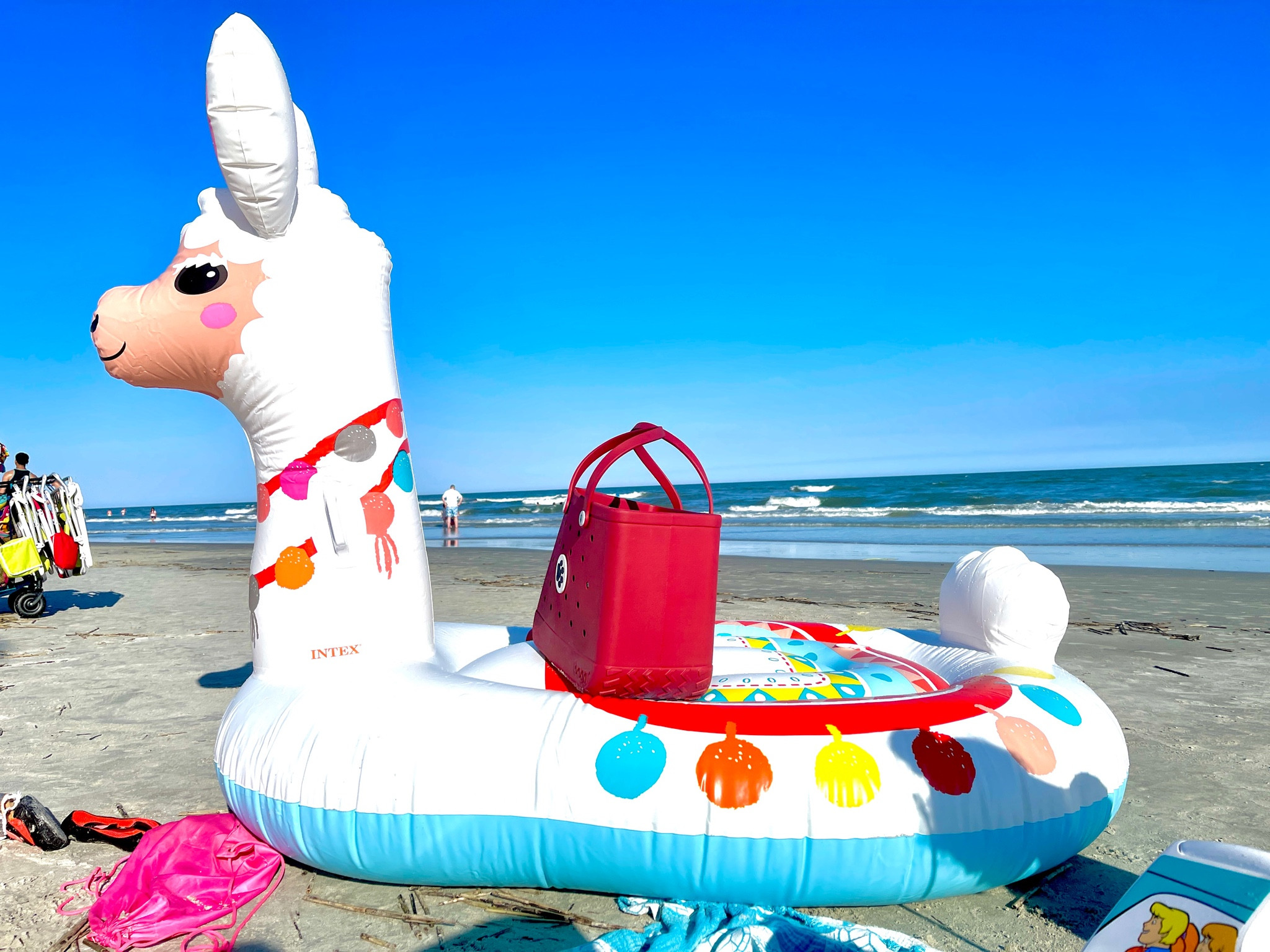 A day on the beach is not complete without a Huge llama float, my Bogg bag, and a Sand Cloud Party Blanket and towel. 
The llama is big enough to fit both of my teens and still have extra room. He is 6.5 feet by 5 feet, and is built to last. 
We use the Flextail portable air pump to blow the llama and other floats up in minutes, and to quickly deflate them when we are ready to leave  
Sand cloud blankets and towels are made of Turkish Cotten, are sand resistant, and lots of designs (we have 8 towels and 1 blanket).

#LTKSeasonal #LTKTravel #LTKSwim
