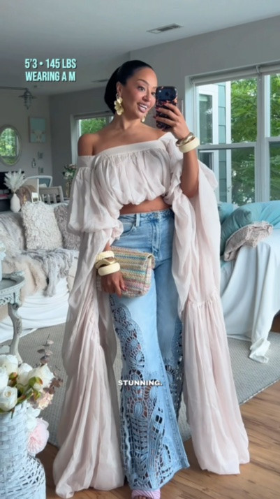 This statement blouse with these insane flowy sleeves? Stunning. 

Ivory bangles are vintage Bakelite. Bag is old from JustFab. 

WHERE TO WEAR IT: country concert, maternity photos, girls night out 
STRETCH: Fabric no but has an elastic waist 
TRUE TO SIZE: Yes but sleeves are extremely long 
OVERALL FIT: Regular 
PETITE FRIENDLY: Tall friendly due to the length of the sleeves 

Sizing ⬇️
5’3 
Bust: 32DD
Waist: 27”
Hips: 42”
Wearing Size M

Make sure you download the ✨FREE✨ LTK app and follow me @heyrissyrozay for all my style and beauty finds 🫶🏽

over 40 outfit ideas
petite curvy outfits