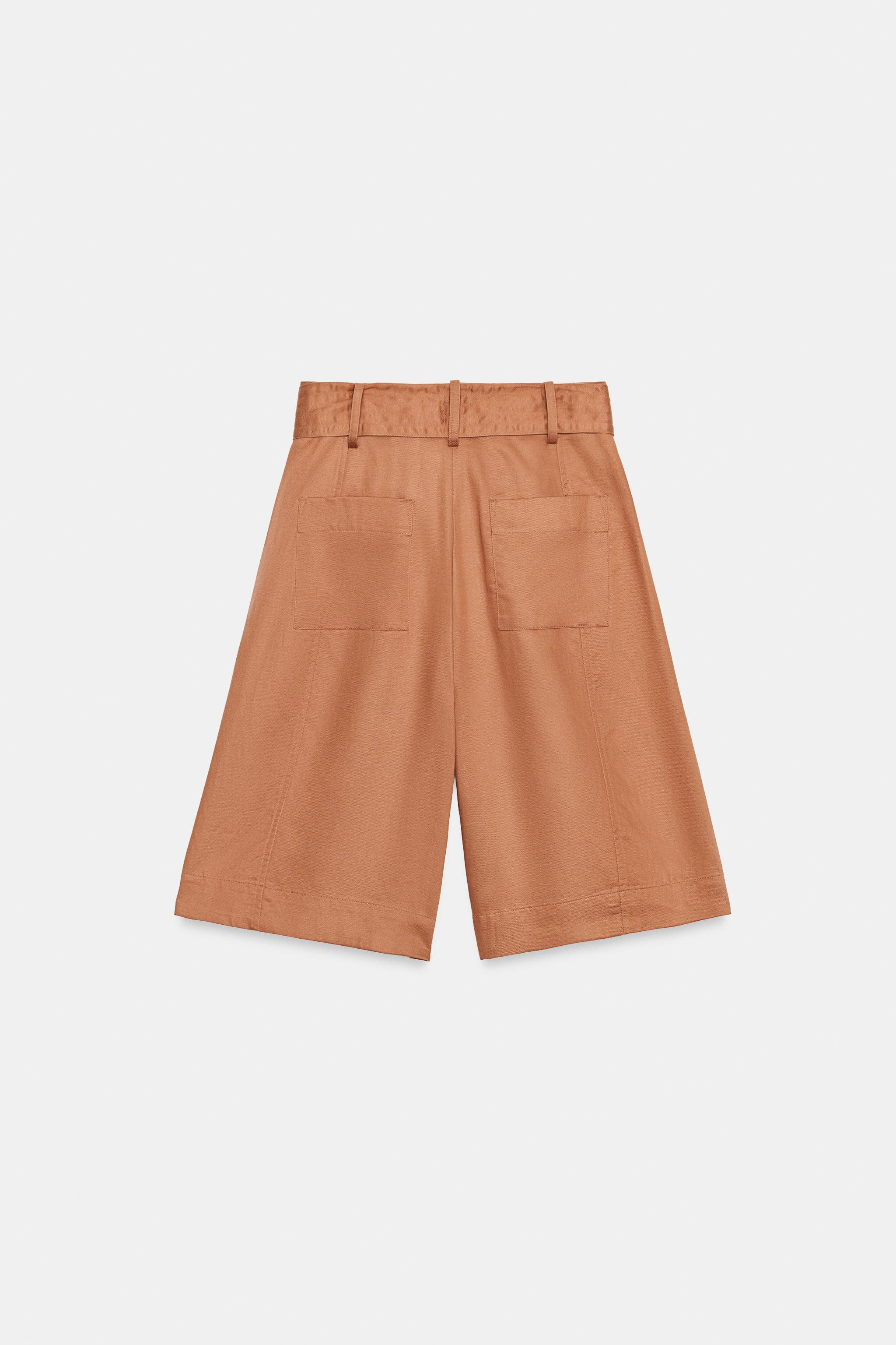 Model height: 183 cmHigh-waisted shorts featuring a matching fabric belt. Front pockets and back ... | Zara US