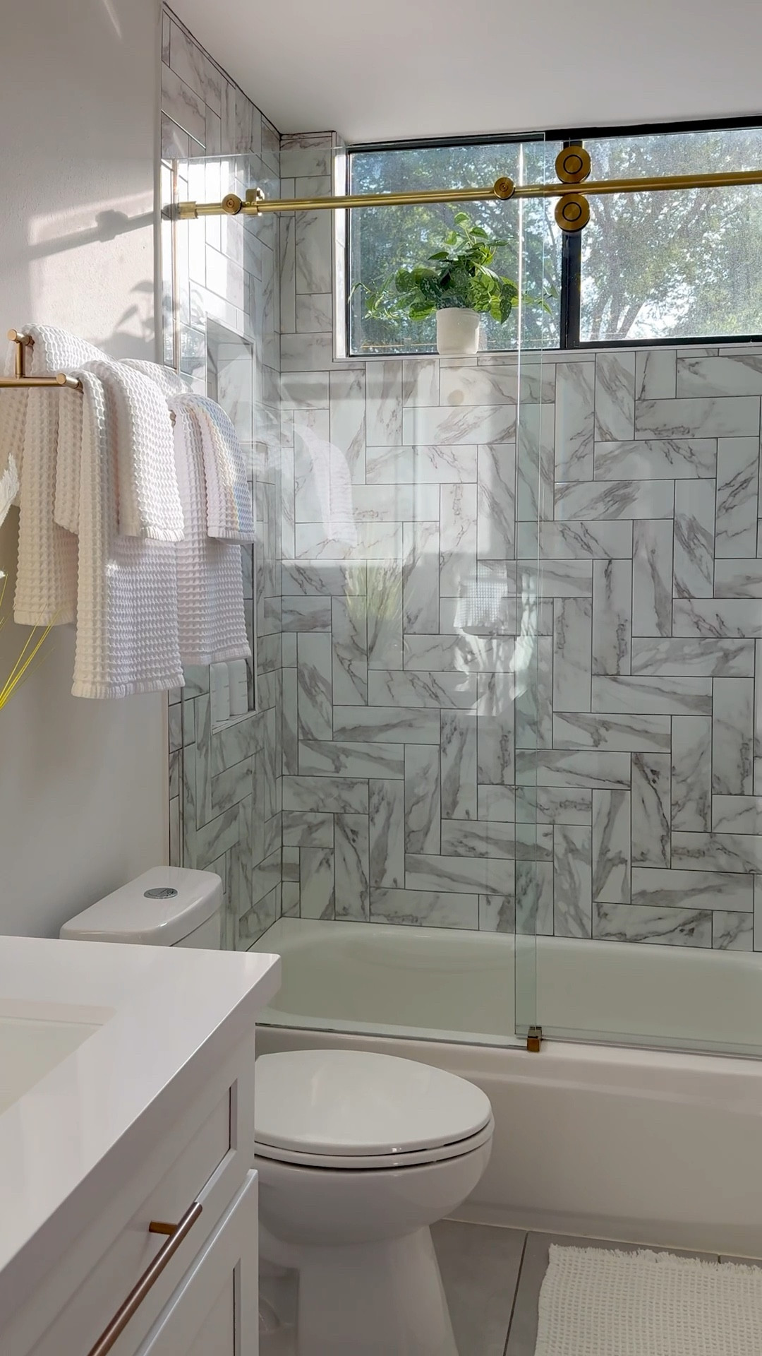 When we moved into our new home I went to hang the usual shower curtain but the beautiful tile stopped me.  I didn’t want to block it and a curtain would make this small bathroom feel smaller.  So I researched options and found these frameless sliding doors from Wayfair. They have a sleek and modern look.

They took 2 people a couple hours to install.  They measured, leveled, drilled & hung the glass then finished up by adding silicone waterproofing on the bottom and fixed side.  They are easy to clean with glass cleaner and a microfiber cloth.  

They are everything I wanted and more! 

#bathroom #wayfair 

#LTKHome