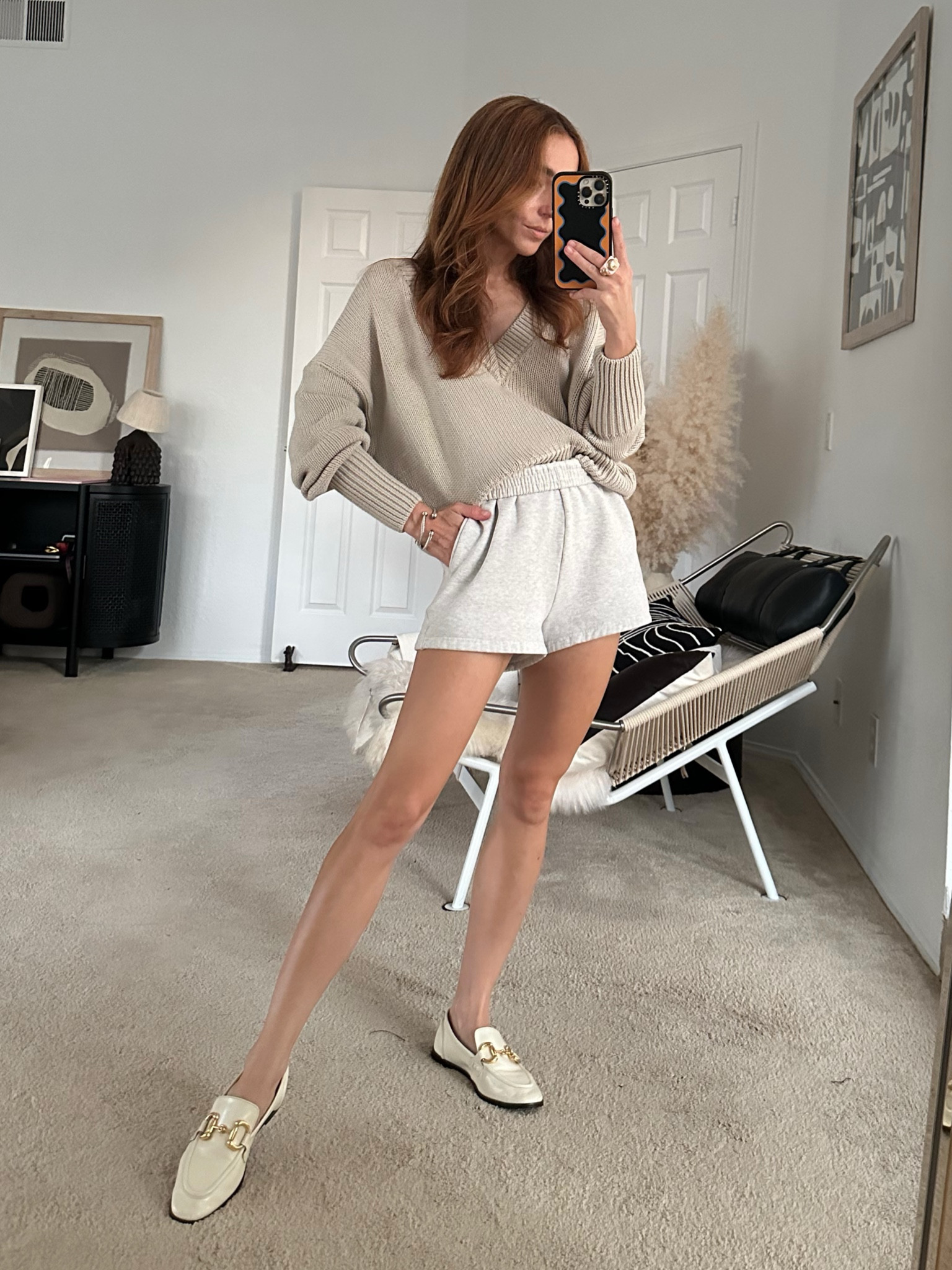 A cozy neutral fall outfit to carry on the weekend errands and activities in Fall style starts with the perfect oversized v-neck sweater. Added loafers for a hint of laid back luxury and as an interesting contrast point to the very casual sweat shorts. 




#LTKshoecrush #LTKfindsunder100 #LTKSale