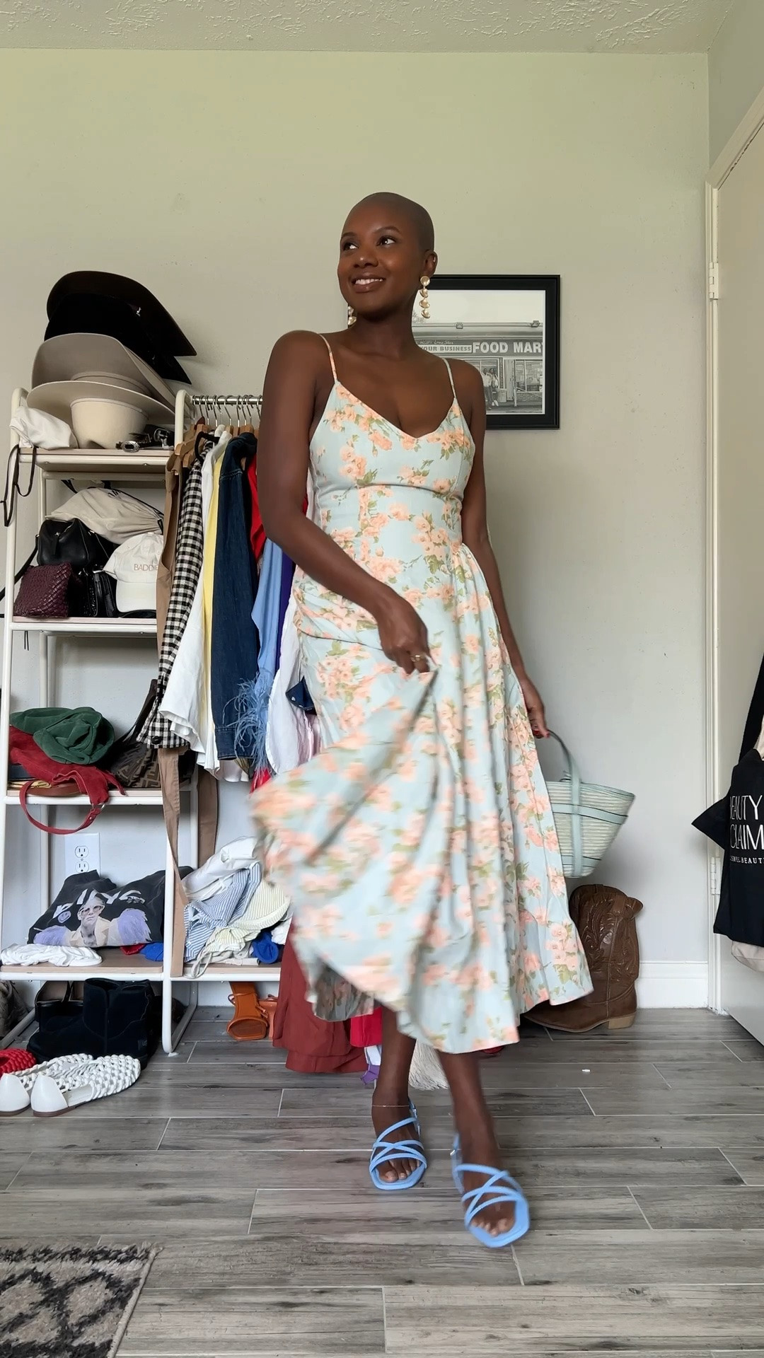 Floral midi dress with adjustable straps and smocking in the back, blue strappy sandals, pearl shell drop earrings and straw top handle Cole Haan purse.

#LTKgrwm #LTKootd #LTKOver40