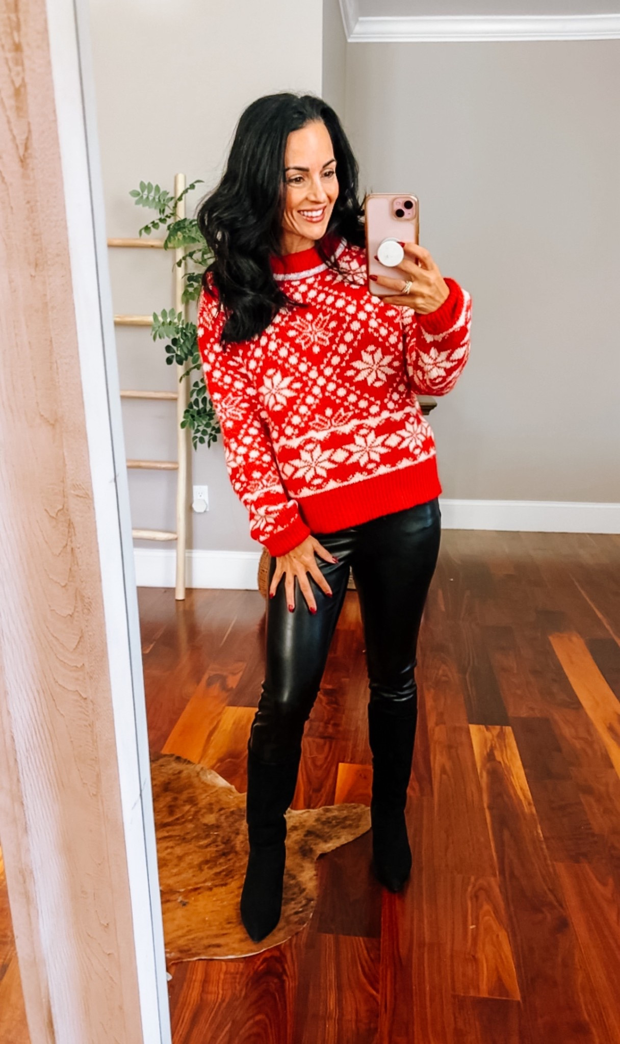 Red snow flake sweater with black faux leather pants 
Code laura15 on boots 

#LTKFindsUnder50 #LTKOver40 #LTKHoliday