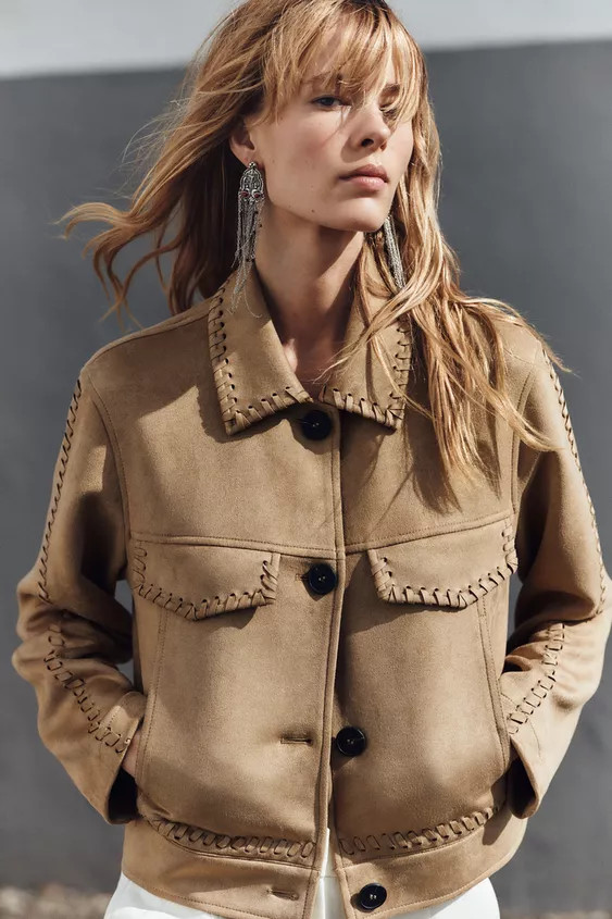 Lapel collar jacket with long sleeves. Front flap detail and braided trim. Front pockets. Front b... | Zara US