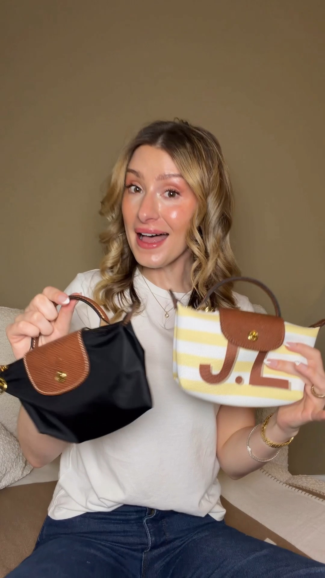 I always get asked about the differences in material and what the My signature customized Le Pliage comes with, so here is a quick break down of all of the differences ♥️ Comment SHOP & I’ll dm you the links ♥️

If you want to make one like My signature custom Le Pliage here is everything I picked to make it:
I picked the pouch model with the striped pattern and then I picked the white and yellow colors. The initial is with the Khaki brown and the shadow is dark brown.

I chose brown trimmings and leather with gold hardware. I did the gold stamping on the outside.

You can also customize any other size Le Pliage and now they have some laptop sleeves and pouches to customize.

Longchamp Le Pliage