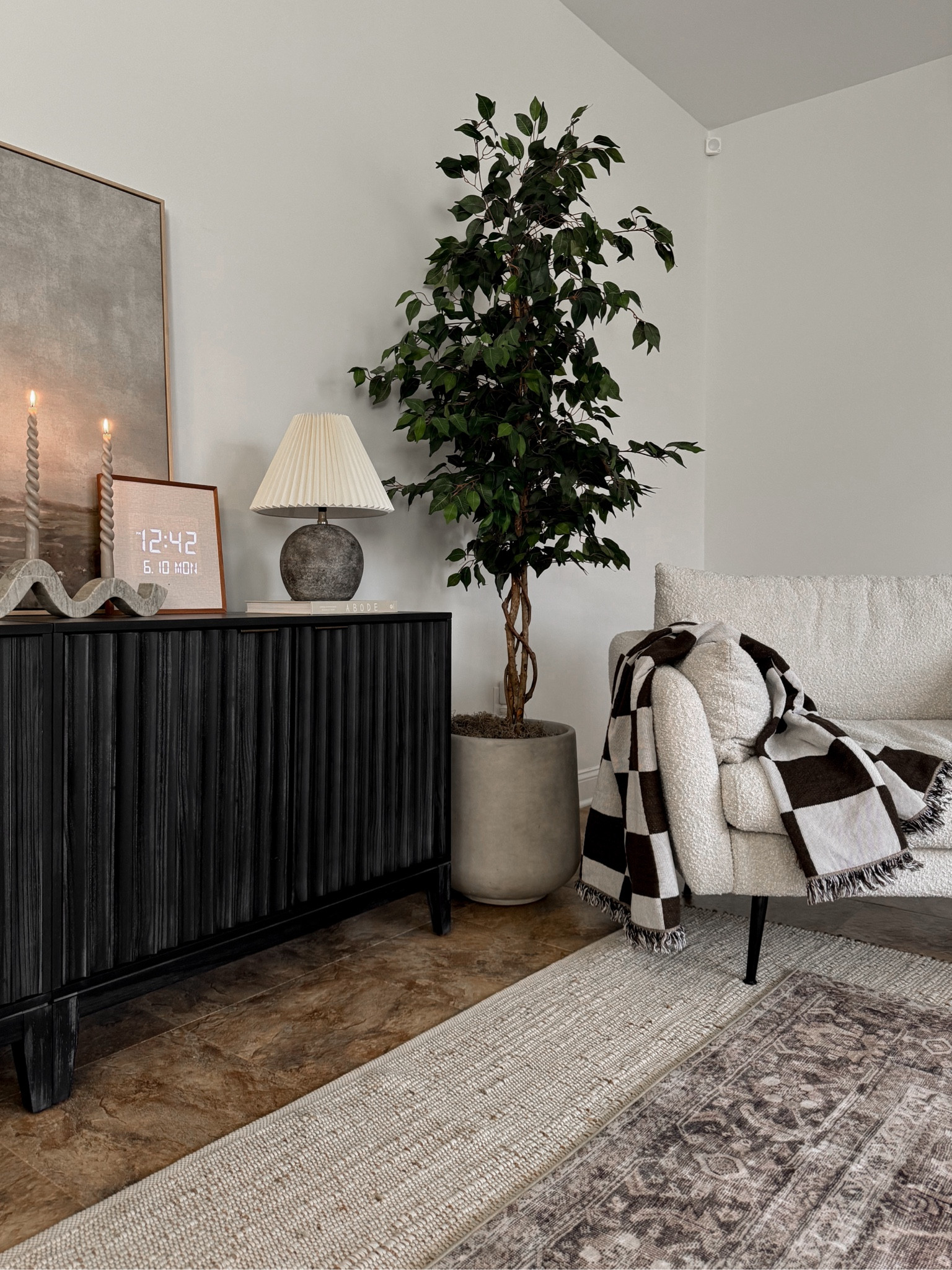 Living room decor, modern vintage style, accent chair, cabinet decor, console styling, moody decor, faux tree, cement planter, fluted cabinet

#LTKHome