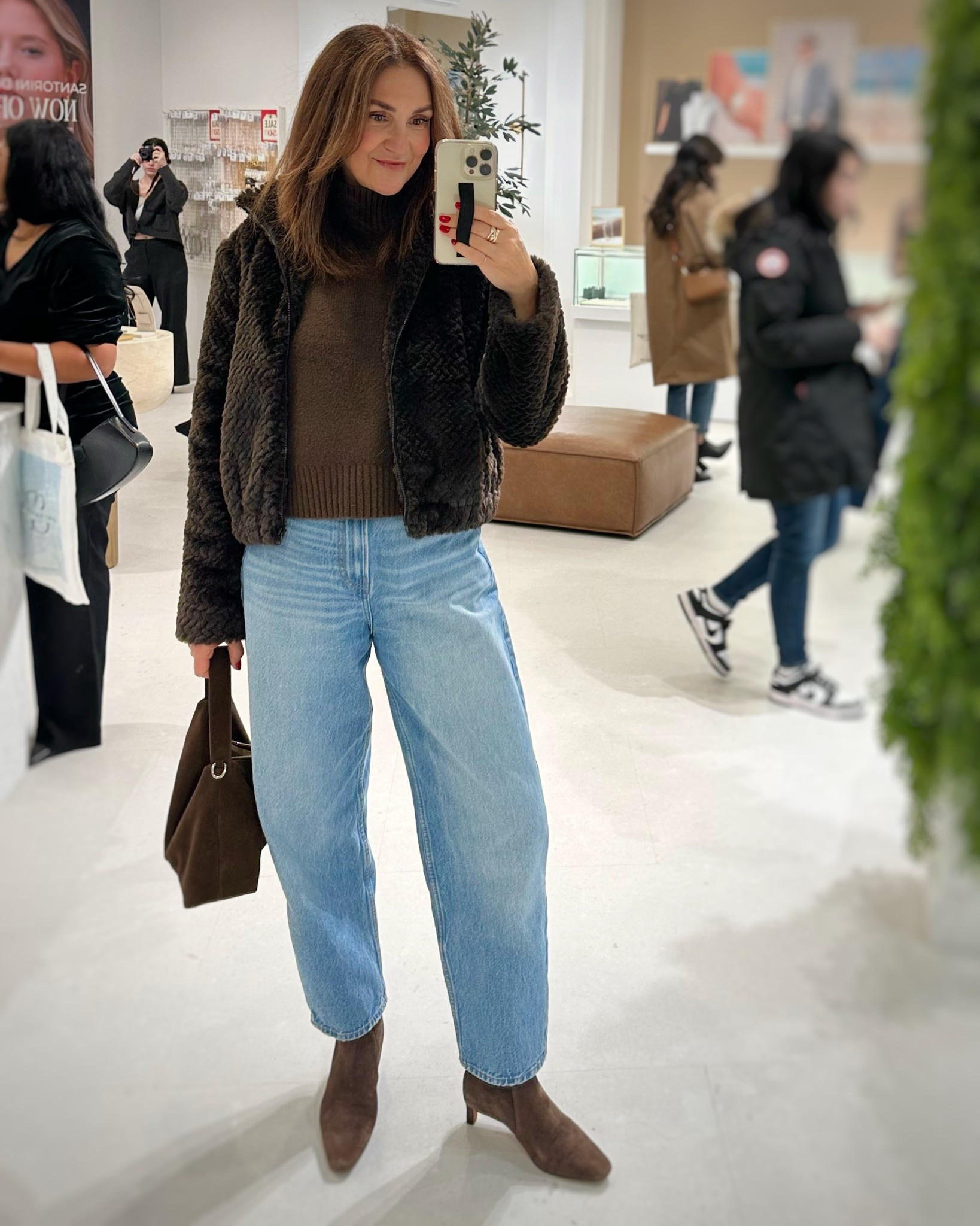 What I wore to the opening of a new jewelry store! 
I’m 5’ 7” size 4ish wearing my usual size S in the mock neck sweater and 4 in the jeans. Suede boots fit tts. Also linked my suede bag.
My faux fur jacket is from Frock box so I can’t link it. 


#LTKOver40 #LTKootd #LTKFindsUnder100