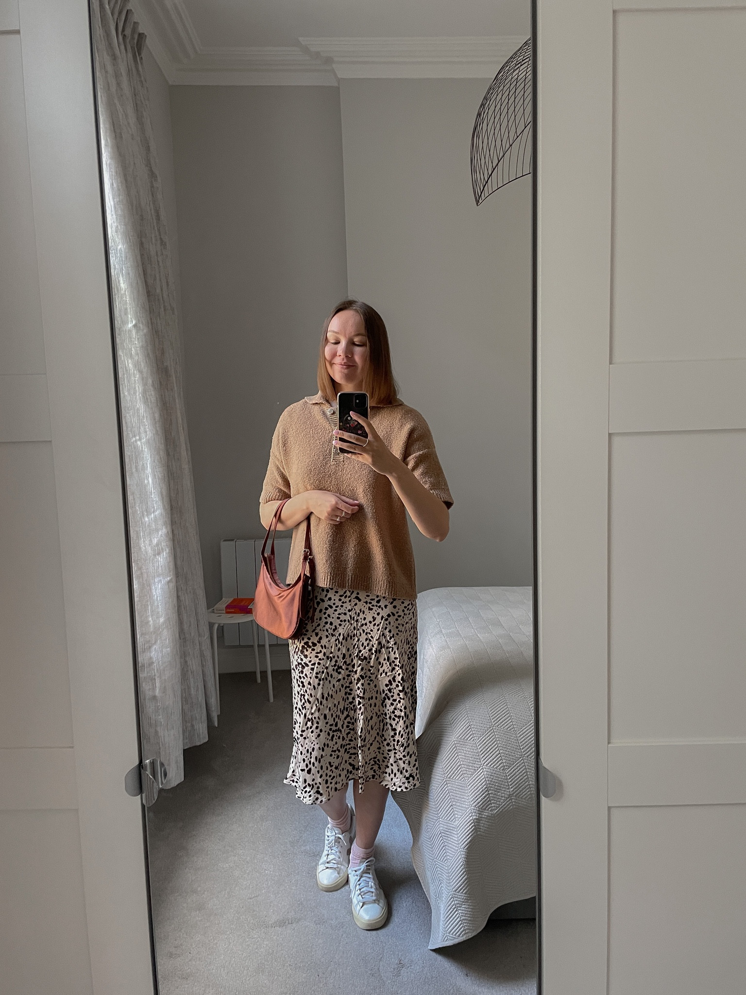 Casual outfit with a silk skirt | 

Minimal style, satin skirt, silk skirt, leopard print, knit polo, Veja sneakers, simple weekend outfit

#LTKSeasonal #LTKstyletip #LTKU