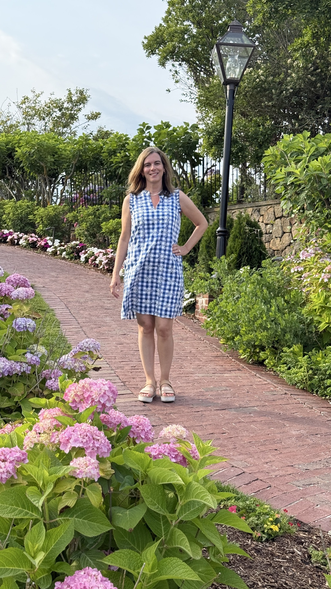We are in vacation and getting ready for dinner tonight and I’m wearing a Lily Pulitzer blue and white gingham summer dress -sleeveless with a cute starfish print. 💙 I am 5’1” and this dress is right above my knees. I dressed it up with a wedge sandal. You could add a summer jacket or shrug for cooler temps.  -vacation dress | coastal dress | vacation dinner dress

#LTKTravel #LTKPetite #LTKOver40