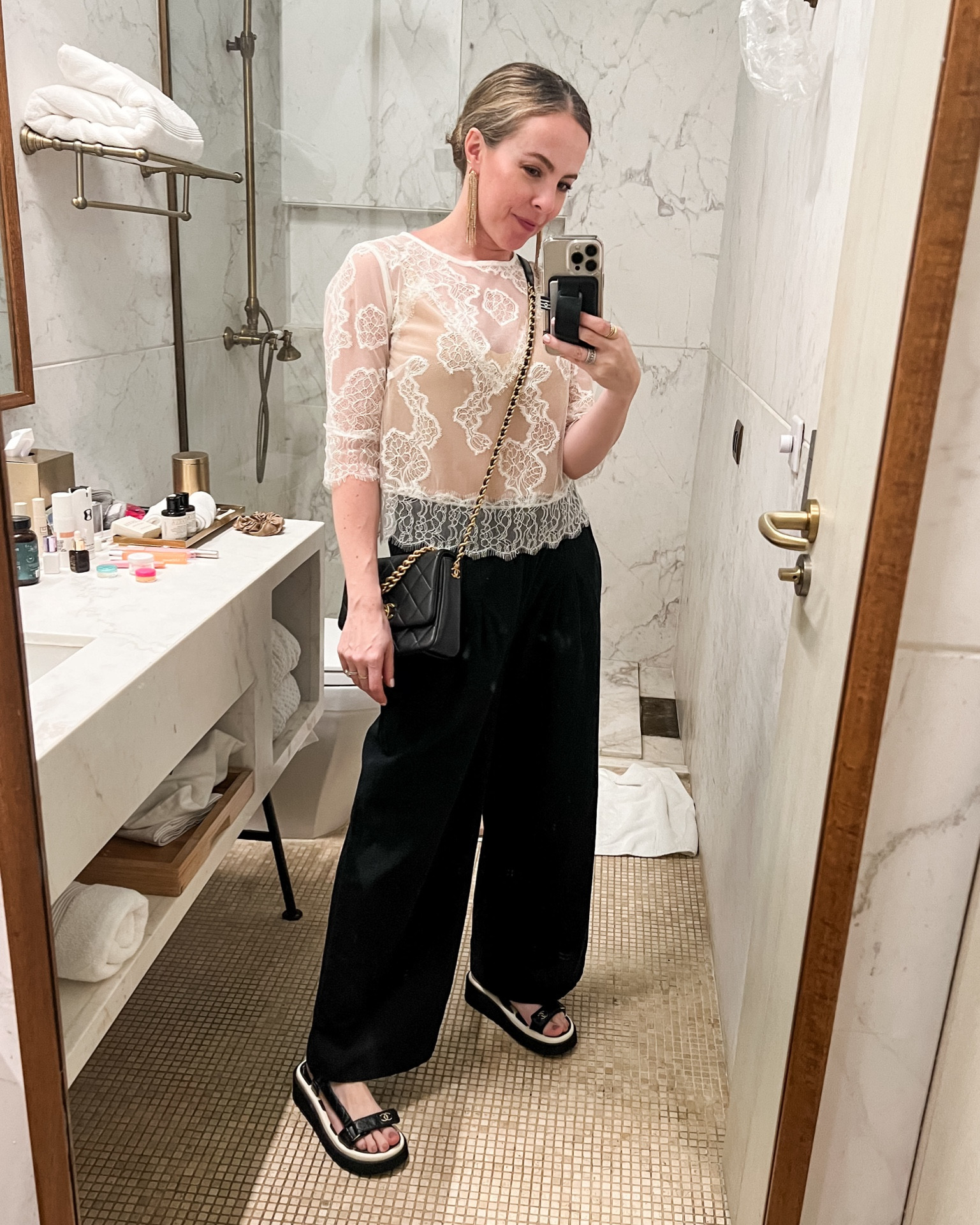 Outfit for dinner out - these pants are super lightweight and affordable. Paired with a cute Anthro shirt and Chanel accessories.

#LTKover40 #LTKtravel