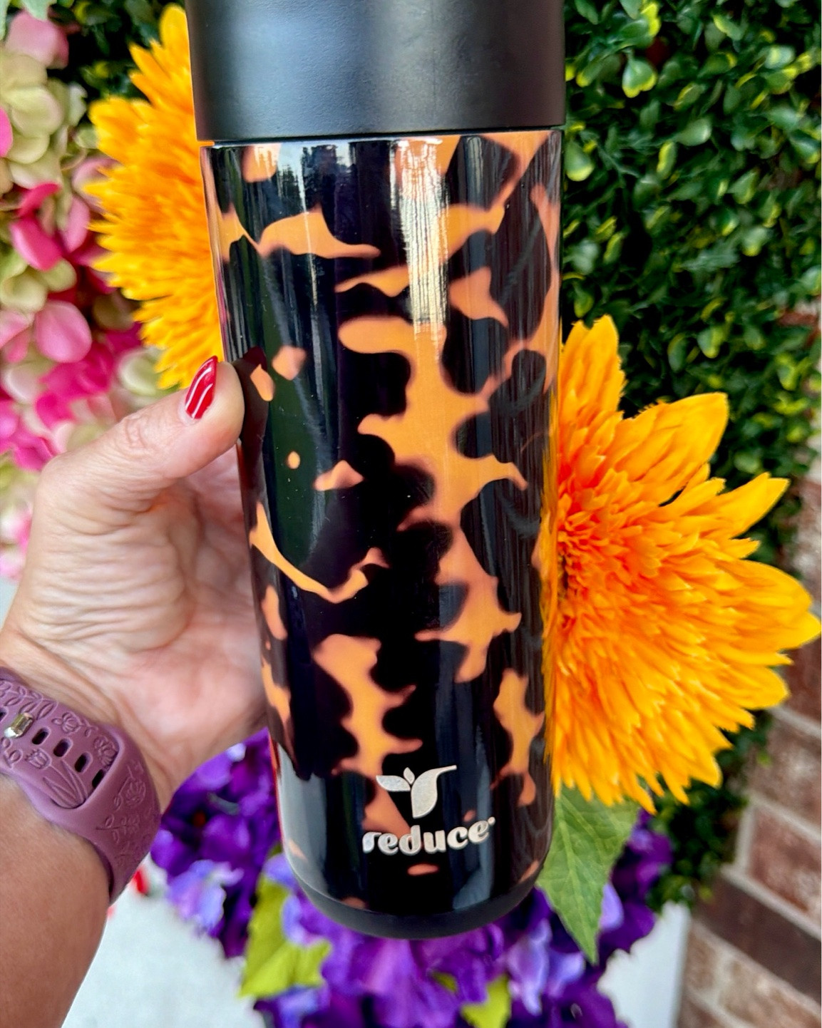 @Target 
Reduce 16oz Perk Insulated Stainless Steel Leak Proof Coffee Tumbler leopard 

The Perk tumbler by Reduce keeps you fueled from carpools to commutes. Perk's lid is leak-proof when closed, so you have one less thing to juggle. The vacuum insulated tumbler keeps drinks hot for up to 6 hours, so your coffee is ready when you are. Plus, the slim design fits cupholders

#LTKmomlife #LTKTravel #LTKHome