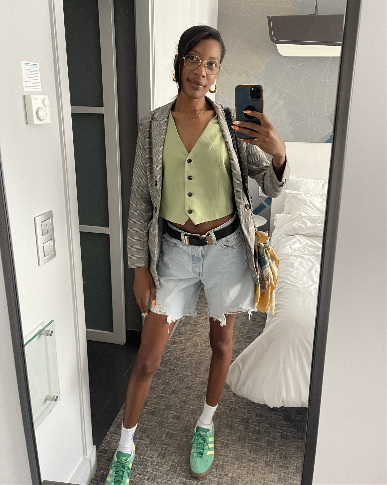 Paris OOTD. A great outfit for when you wanna be cute and comfy while walking a ton. Or my go to  fall time transition outfit, perfect for the warmer days I catch in LA. 

✨Jacket - Beige plaid blazer from Zara (can’t link exact but very similar ones linked)
✨Vest - Sage green vest from Zara (can’t link but tons of similar ones linked)
✨Belt - Black buckle belt from Asos 
✨Shorts - Levi’s Destructed 501 Mid Thigh Shorts in Light Indigo
✨Socks - IDGAF socks from fashionnova (same pair linked from different retailer)
✨Sneakers - Adidas Gazelle in Semi Court Green, Almost Yellow and Gum
✨Bag - Zara Bucket bag 
✨Glasses - Ray ban RB3682 OPTICS in polished arista gold 
✨Jewelry - target thick hoops, herringbone necklace from Raediate jewelry (similar linked)
✨Scarf on bag - used a headscarf from the beauty supply you can also find these silky scarves at target or Amazon 

#LTKTravel #LTKStyleTip #LTKShoeCrush