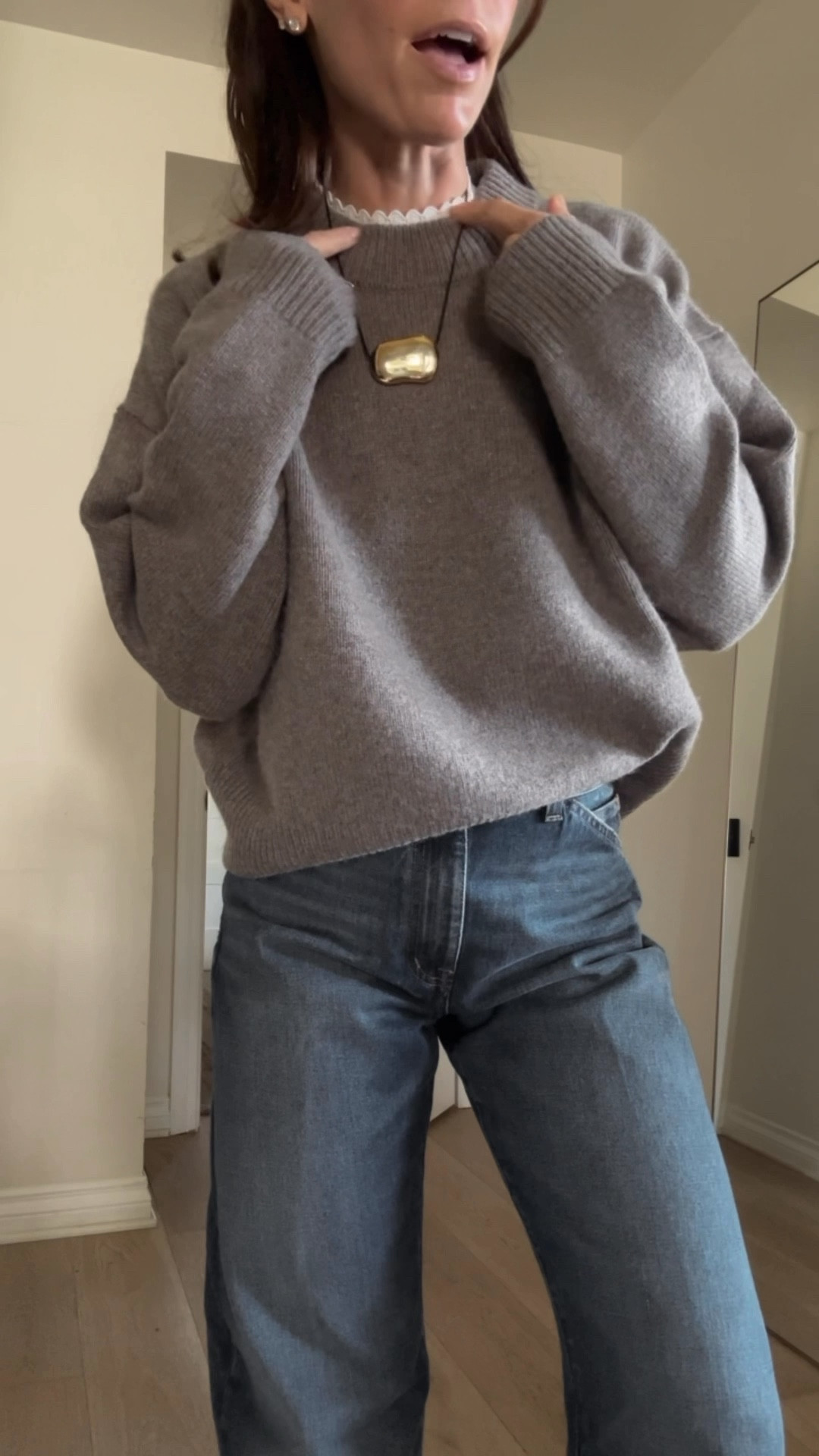 Love the lettuce hem on this Pointelle top and now easily it peeks over th collar of the sweater 

#LTKPetite #LTKOver40