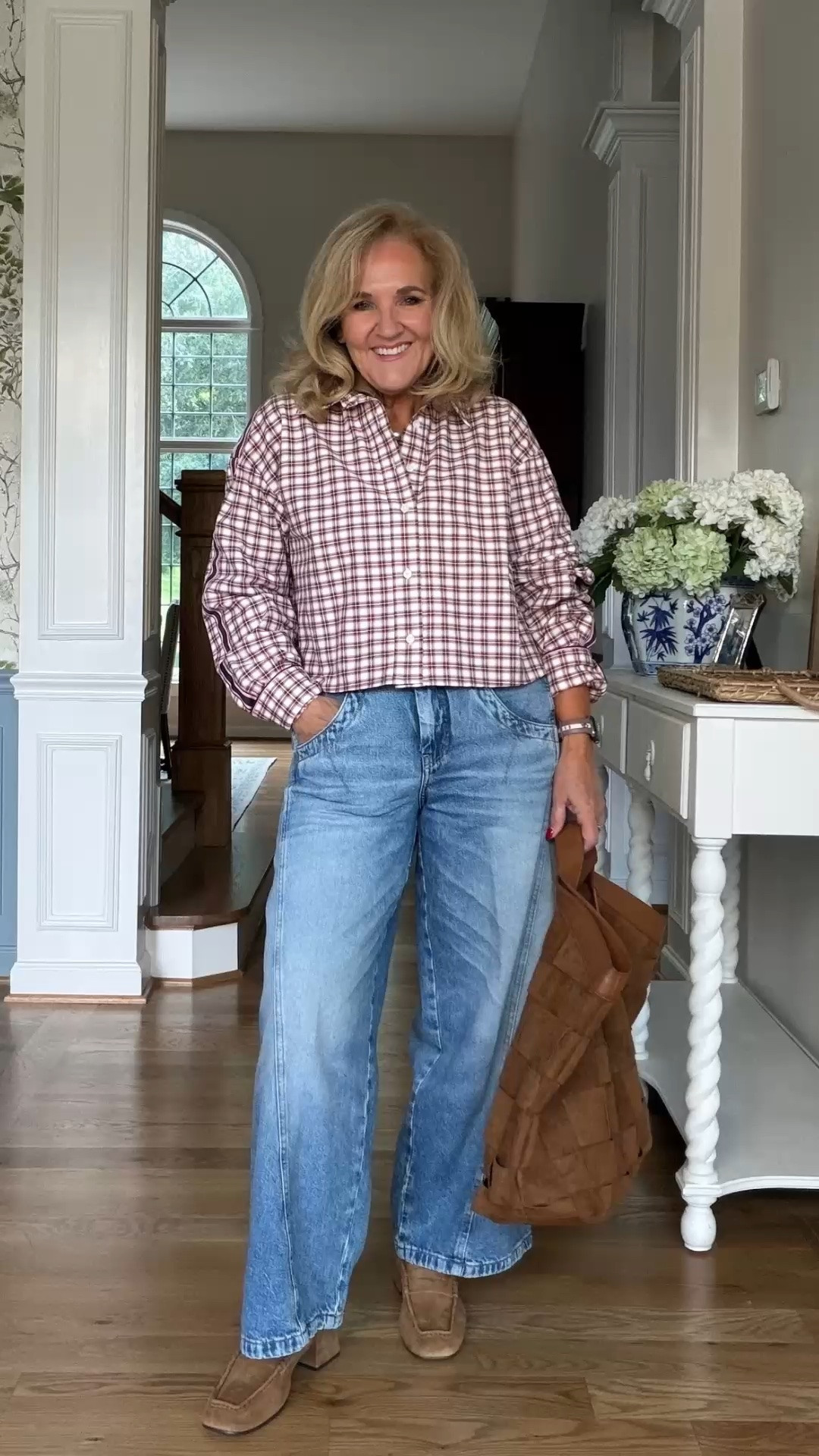 This gingham button-front top is an easy way to make relaxed denim feel polished. The cropped length works beautifully with wide-leg jeans, while the soft brown accessories keep the look casual and pulled together.

💡 LTK MADE EASY
❤️ Heart = Support my posts!
🔖 Save = Get sale & restock alerts
📋 Lists = Keep favorites organized
📲 Share = Send lists and products to a friend. Hello, Christmas List!
💬 Comment = Ask me anything about what I'm wearing.:-)

#LTKootd #LTKWorkwear #LTKOver40