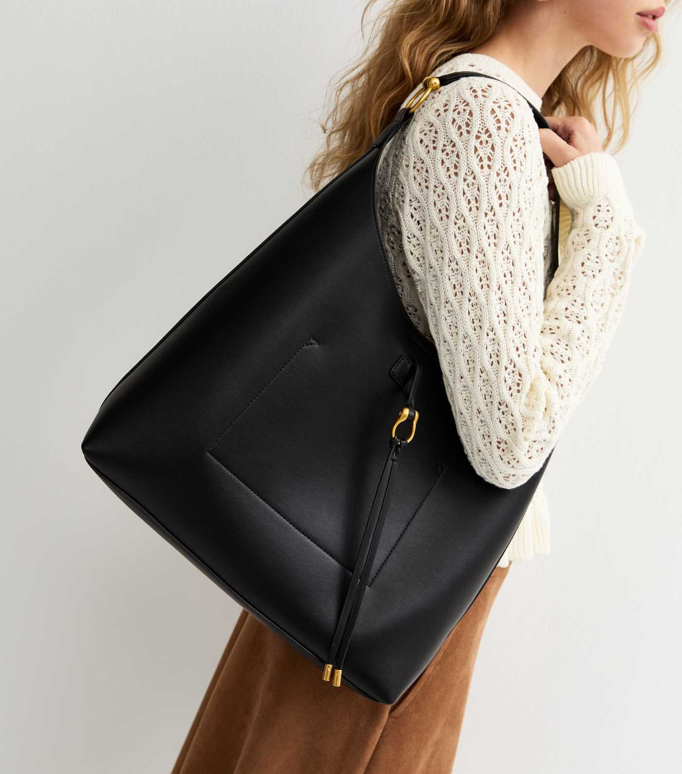 Black Faux Leather Tassel Hobo Tote Bag | New Look | New Look (UK)
