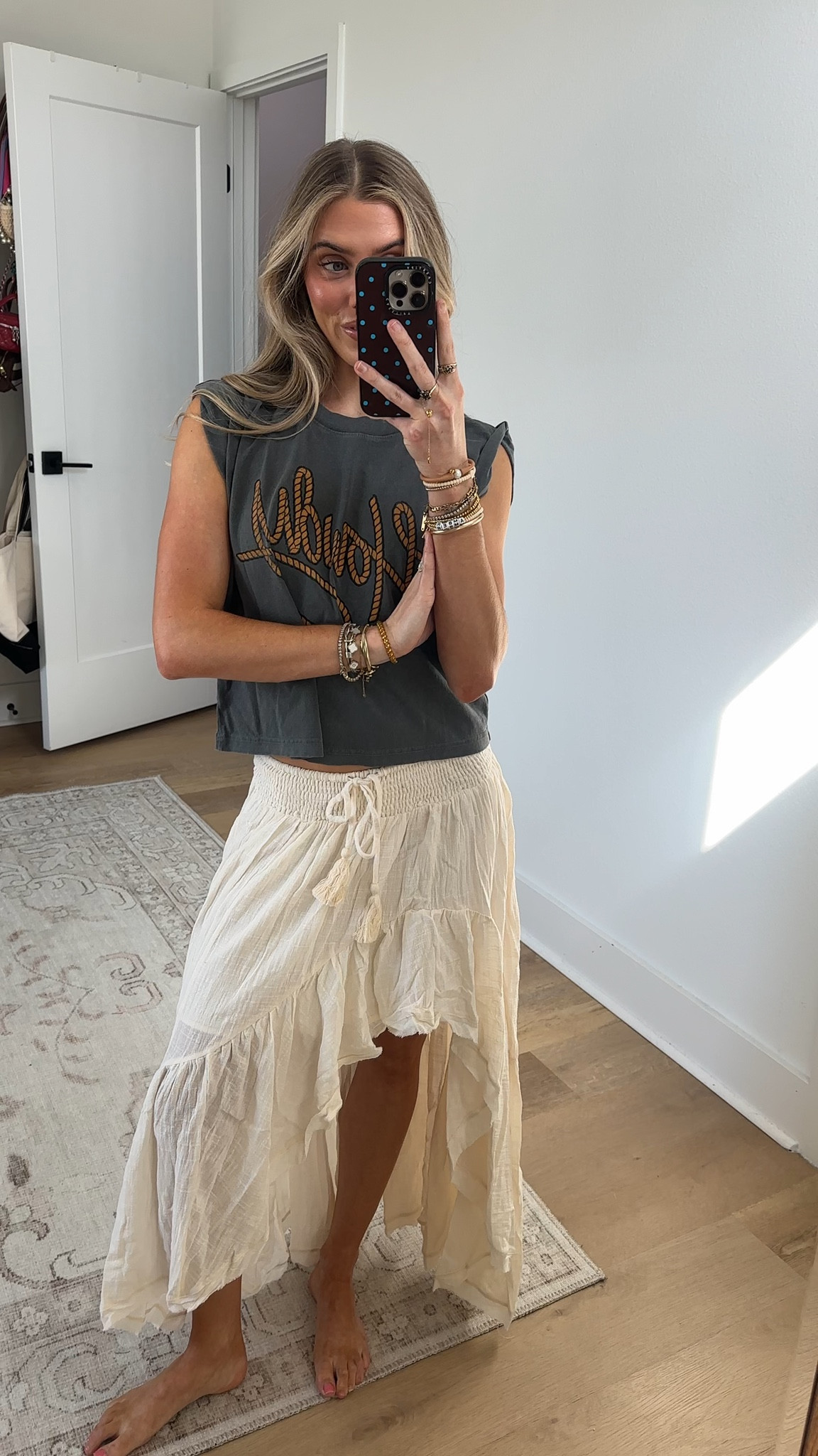 @VICI size XS. My code is SLOANE35. Flow into effortless elegance with the Harmonic High Low Maxi Skirt. This stunning skirt, made from lightweight gauze fabric, dances with every step, making it the perfect companion for your festival adventures. The smocked waist with a drawstring tassel tie closure ensures a perfect fit while adding a playful touch. Featuring a fabulous high-low tiered hem with charming frayed details, this skirt brings a relaxed yet chic vibe to any outfit.

#LTKSaleAlert #LTKFestival #LTKootd