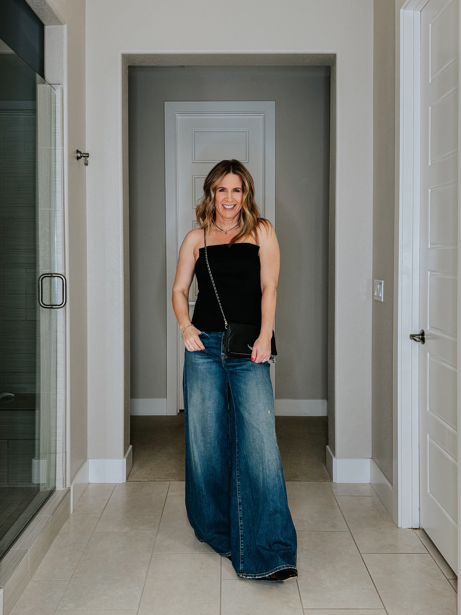 Invest in good basics and you’ll always have something to wear!
#tibi #straplesstop #widelegjeans #nililotan

#LTKstyletip #LTKitbag #LTKparties