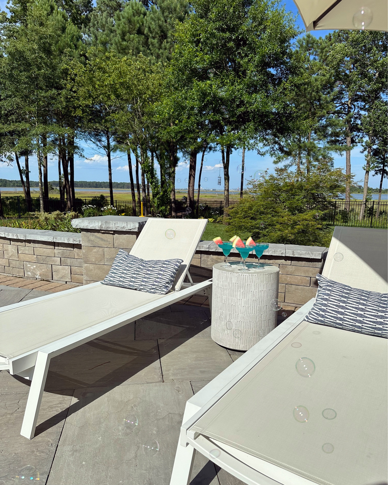 Poolside lounge chairs, plastic margarita cups and an outdoor  concrete side table 🌞

#LTKhome #LTKSeasonal #LTKswim