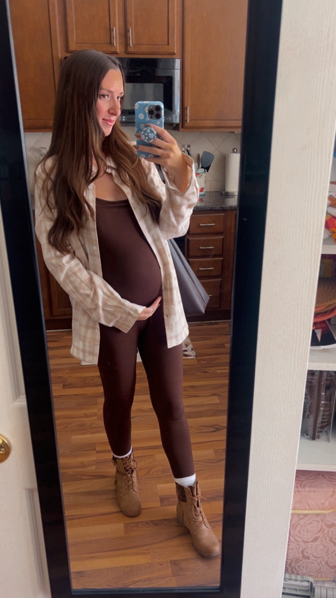 Obsessed with this flannel from Pink Lily 😍 I sized up to go with the bump 🤰🏻 use the coupon code- OCTOBER20 to get 20% off! 

#LTKBump #LTKFindsUnder50 #LTKStyleTip