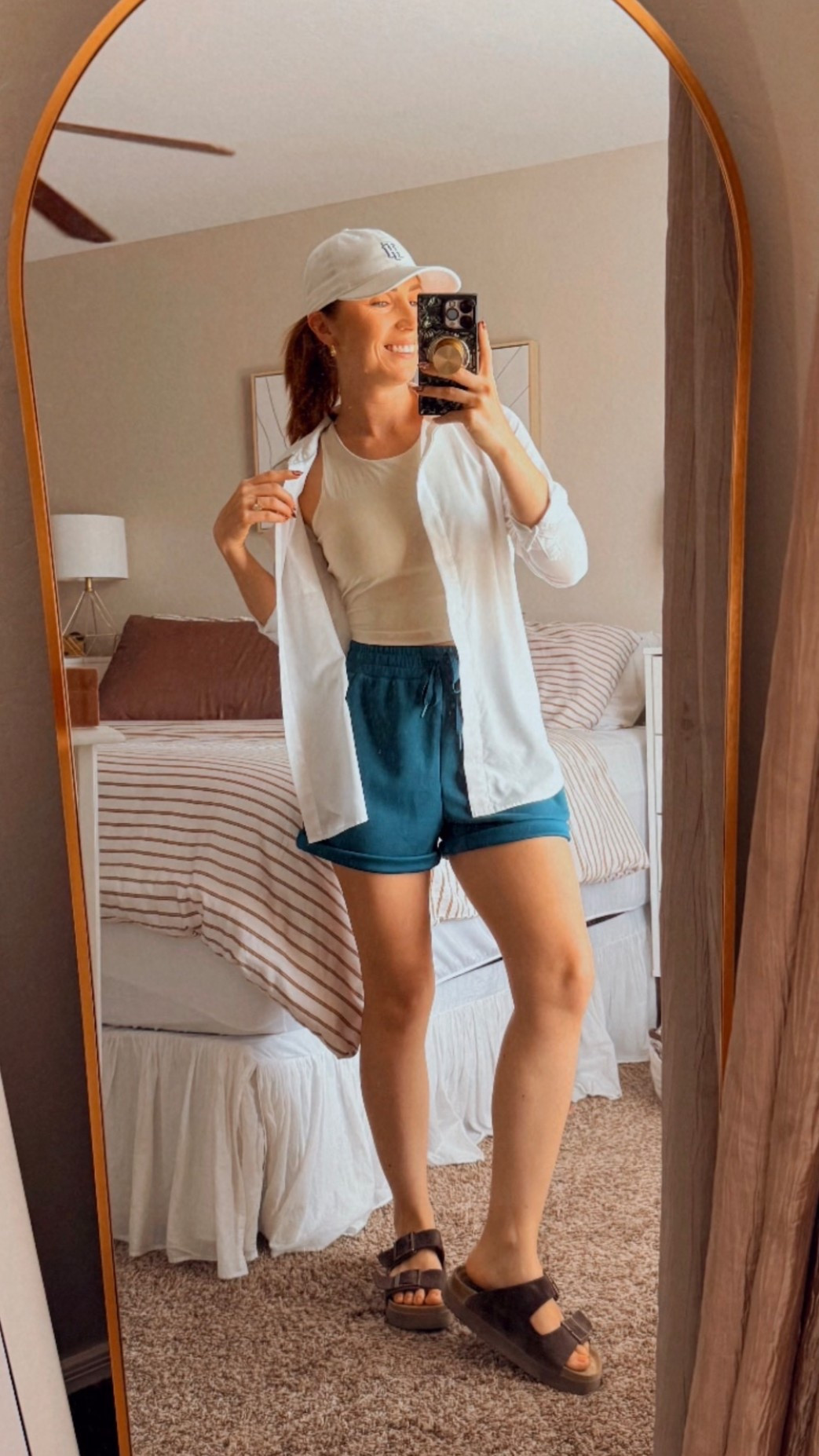 High neck Racerback activewear top- bone white size S. Peacock blue silky soft activewear shorts with drawstring and pockets- size medium- fits my 26” waist and 37” hips perfectly 👌🏻. Brown suede platform cork sandals- tried to size and super comfortable!

#LTKActive #LTKootd #LTKfitnessgoals