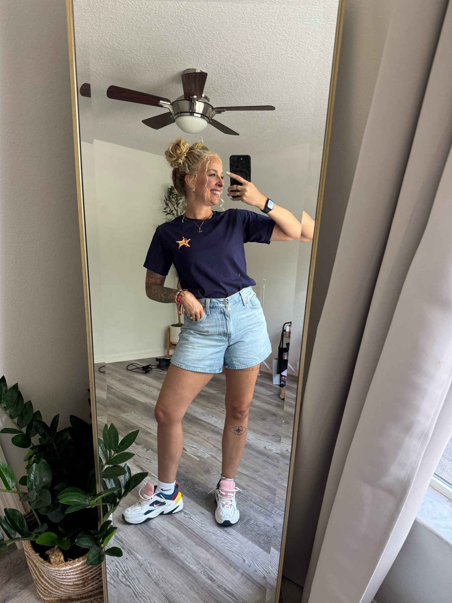 Cinched waist Levi’s jean shorts from target
Toy story T-shirt ￼

#LTKootd #LTKOver40 #LTKSeasonal