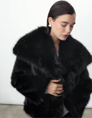 Stradivarius Cropped faux fur jacket in black | ASOS (Global)