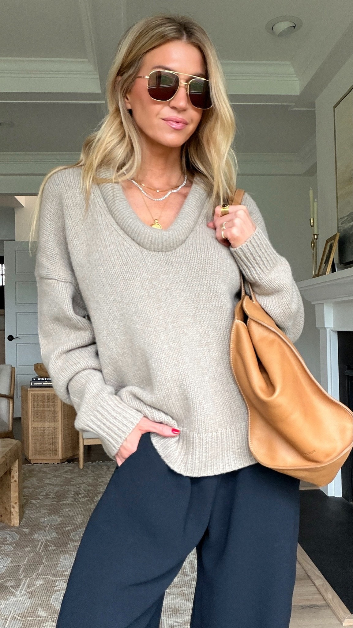 al look for a rainy day. 

Oatmeal cashmere low rolled neck sweater: runs oversized, wearing S
Black balloon pants: TTS, wearing S
Black sandals: runs small, size up

#LTKootd #LTKgrwm #LTKSeasonal