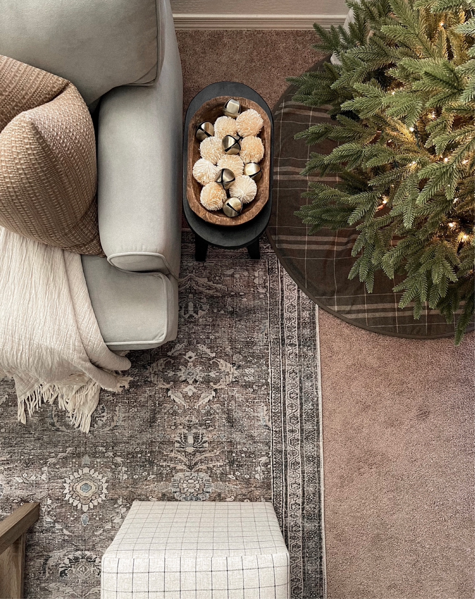 Christmas. Tree. Styling. Home. Holiday. Greens. Neutral. Neutrals. Loloi rug. Area rugs. Warm. Warmth. Earth tones. Simple. Classic. Holidays. Inspo. Inspiration. Home decor. Decorations. Living room. Grey couch. Gray sectional. Tips. Throw pillow. Throw blanket. Stool. Blacks. Black. Cream. Creams. Gold bells. Christmas bell. Dough bowl. Vase filler. Inviting. Cozy. Timeless.

#LTKSeasonal #LTKHoliday #LTKsalealert