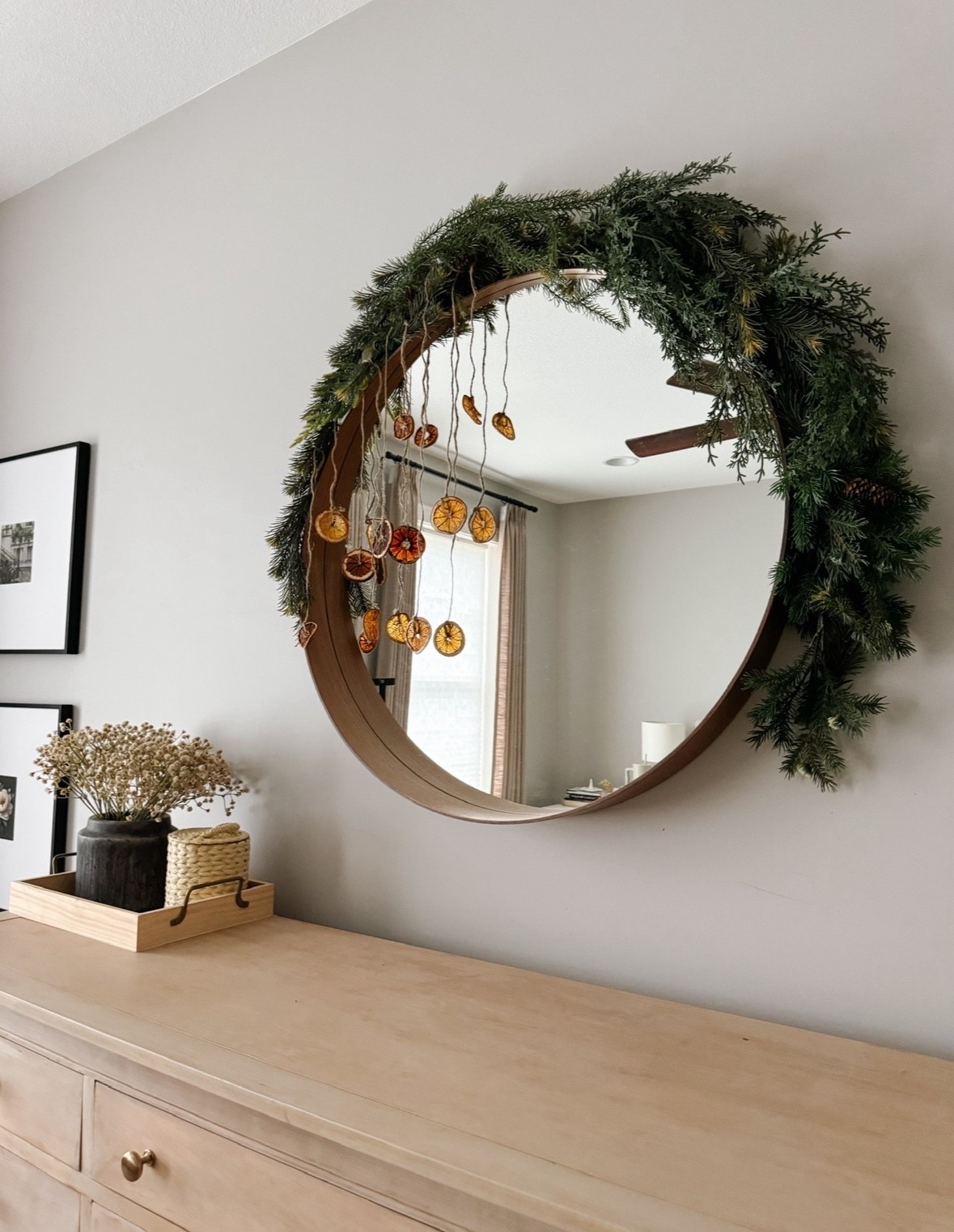 Dried oranges and winter greenery draped over a mirror bring the coziest, citrus-glow kind of holiday decor—simple, natural, and so beautiful. it’s an easy way to add warmth, texture, and a hint of festive charm to any room, especially when you’re leaning into organic, timeless christmas styling.

#naturalholidaydecor #driedoranges #simplechristmasdecor #greendecorideas #cozyholidayhome #neutralchristmastyle #organicdecor #holidayhomedecor

#LTKHome #LTKSeasonal #LTKHoliday