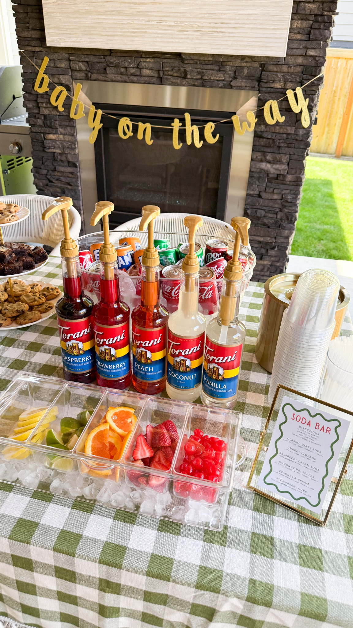 DIY SODA BAR FOR YOUR NEXT PARTY! 

Checkered Tablecloth, hanging garland, sprite, coke, beverage tub, pump dispenser, Torani drink syrup soda, dr pepper, plastic cup, cake, dried flowers, bud vases, metal ice bucket 

#LTKParties #LTKHome #LTKFindsUnder50