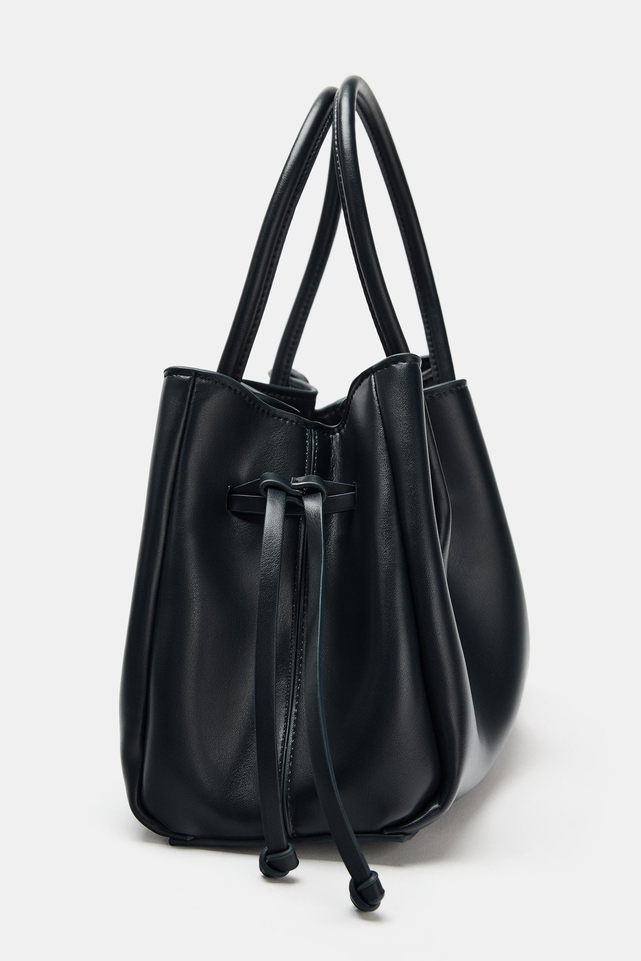 City crossbody bag. Double top handles and a crossbody strap. Inside zip pocket. Gathered fasteni... | Zara UK