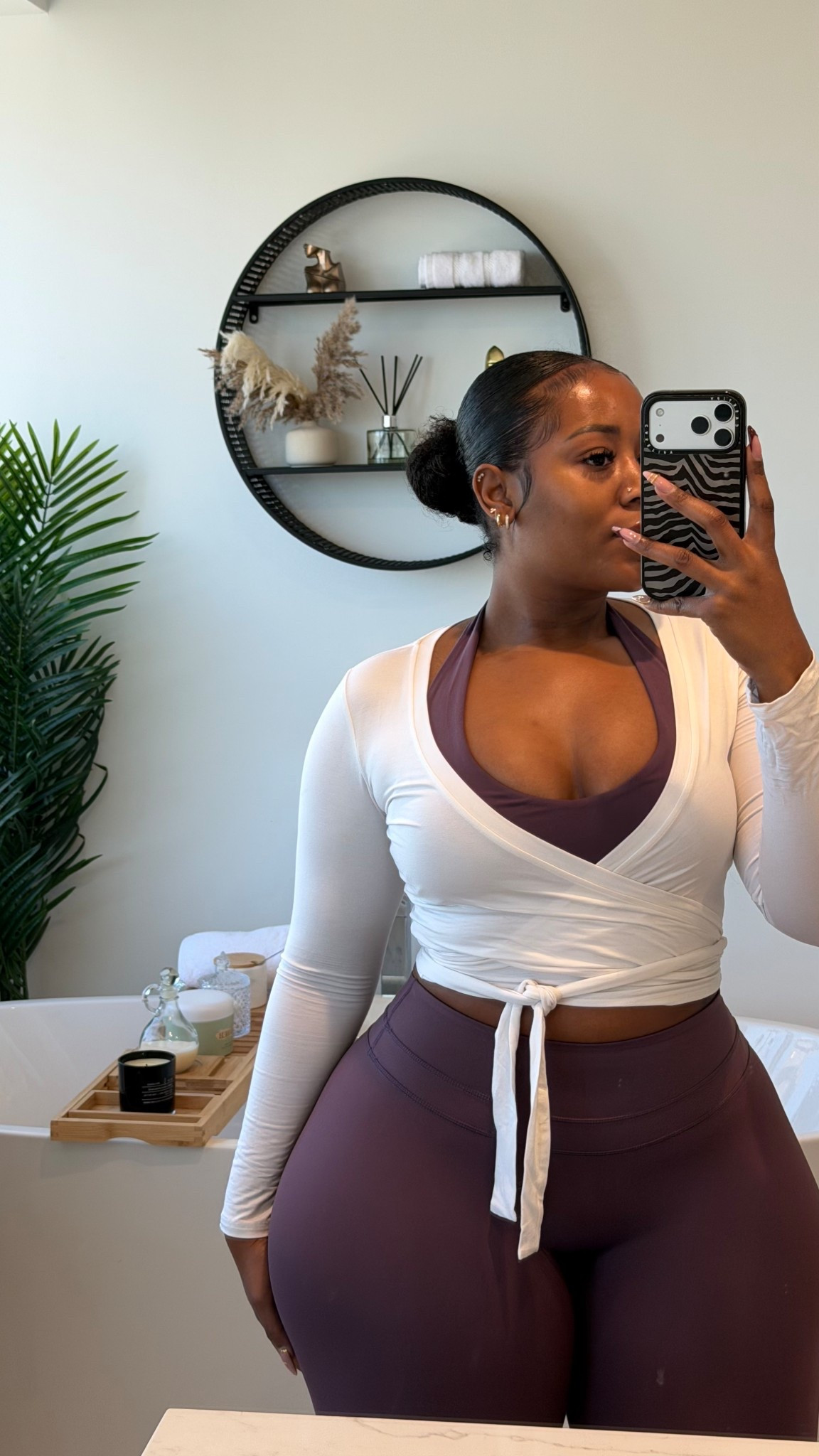 Hot girl walk OOTDs are my fave ✨ wearing a medium in the wrap top and a large in the workout set

#LTKActive #LTKPlusSize #LTKMidsize