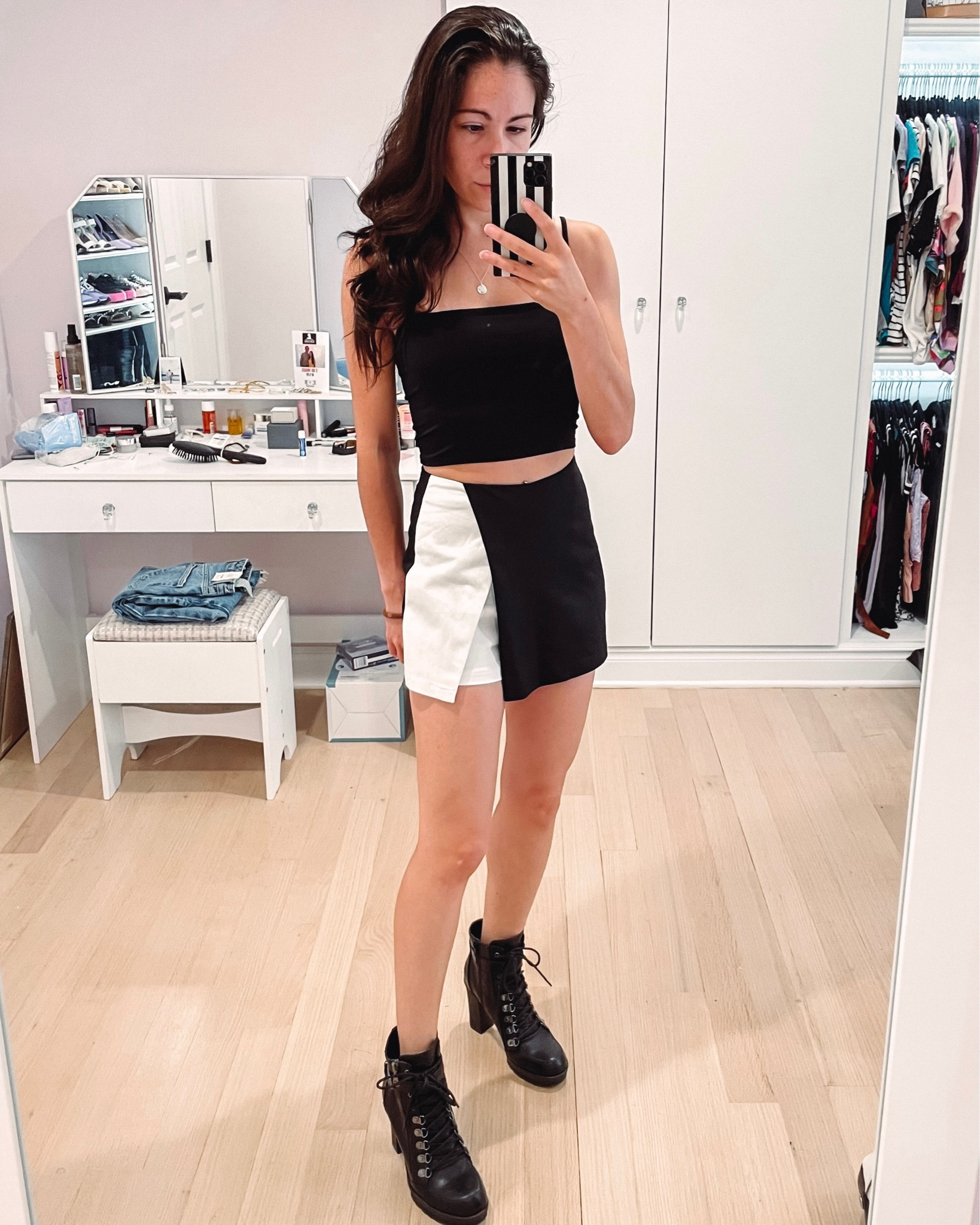 Love my new black and white skort from revolve! Cute fit and pairs nicely with my cropped tank from express. A great summer look and I’ll throw a leather jacket on top for the fall. 

#LTKunder100 #LTKSeasonal #LTKtravel
