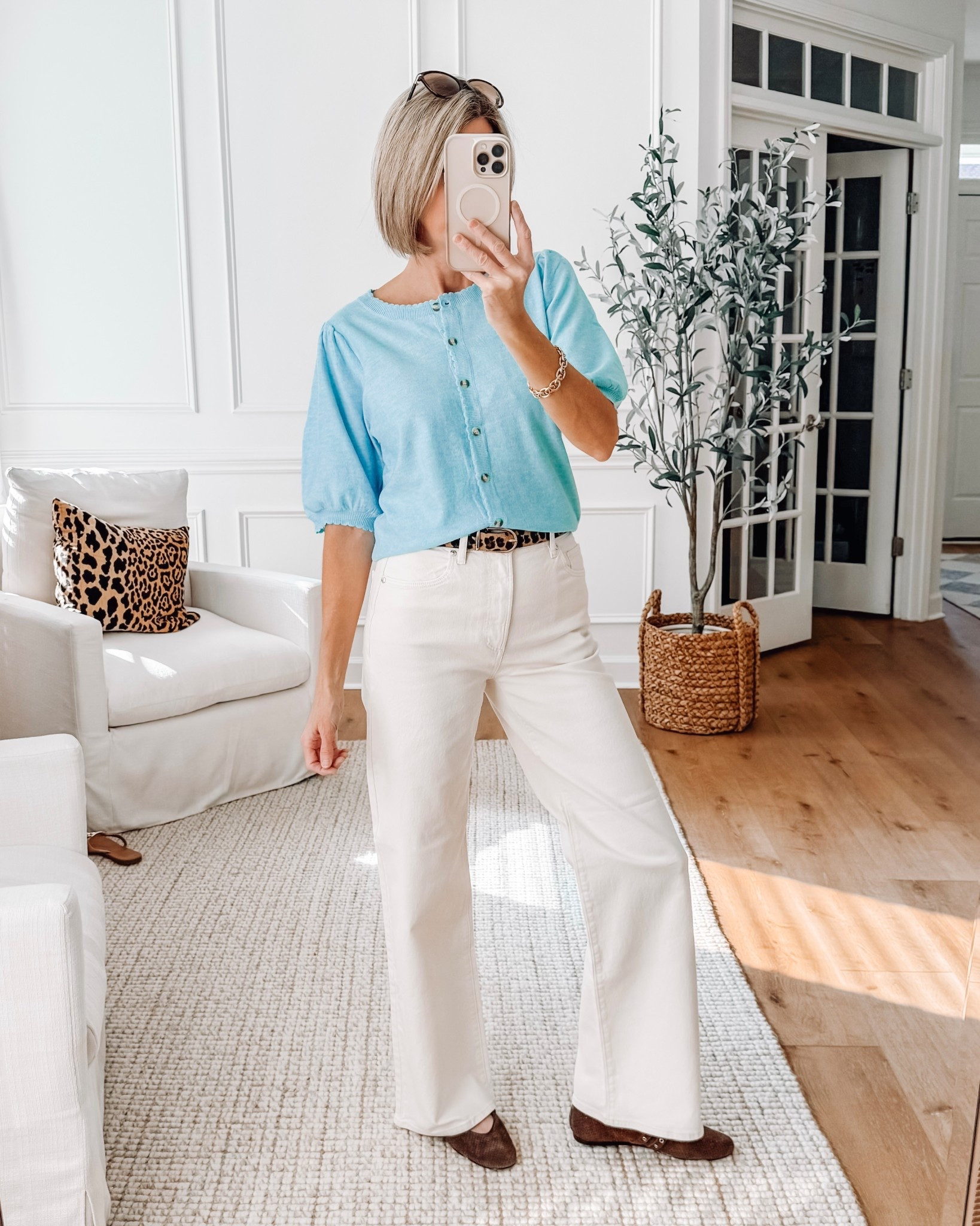 The prettiest light blue cardigan from Amazon. Soft and lightweight wearing a small 
Wide leg cream colored jeans wearing a 26/2 

Cardigan sweater | Workwear | White jeans outfit | Spring outfit idea 



#LTKSaleAlert #LTKSeasonal #LTKSpringSale