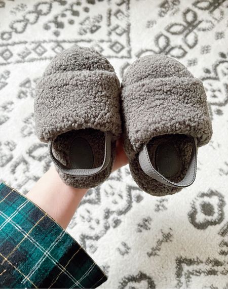 Cutest little baby slipper slides ever with stretchy band for back to secure! At target only $10! Single Strap Faux Shearling Slippers - Cat & Jack!

Baby, baby shoes, baby slippers, baby ootd, toddler, kids 

#LTKshoecrush #LTKkids #LTKbaby