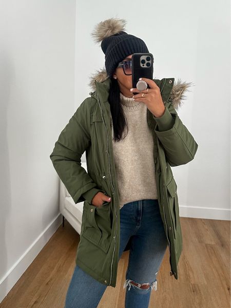 Time and Tru Women's and Women's Plus Heavyweight Anorak Coat with Hood wearing size small. No Boundaries Women's Chelsea Boots with Knit Panel wearing size 9. Easy Funnel Neck Sweater wearing size medium. Pom Beanie