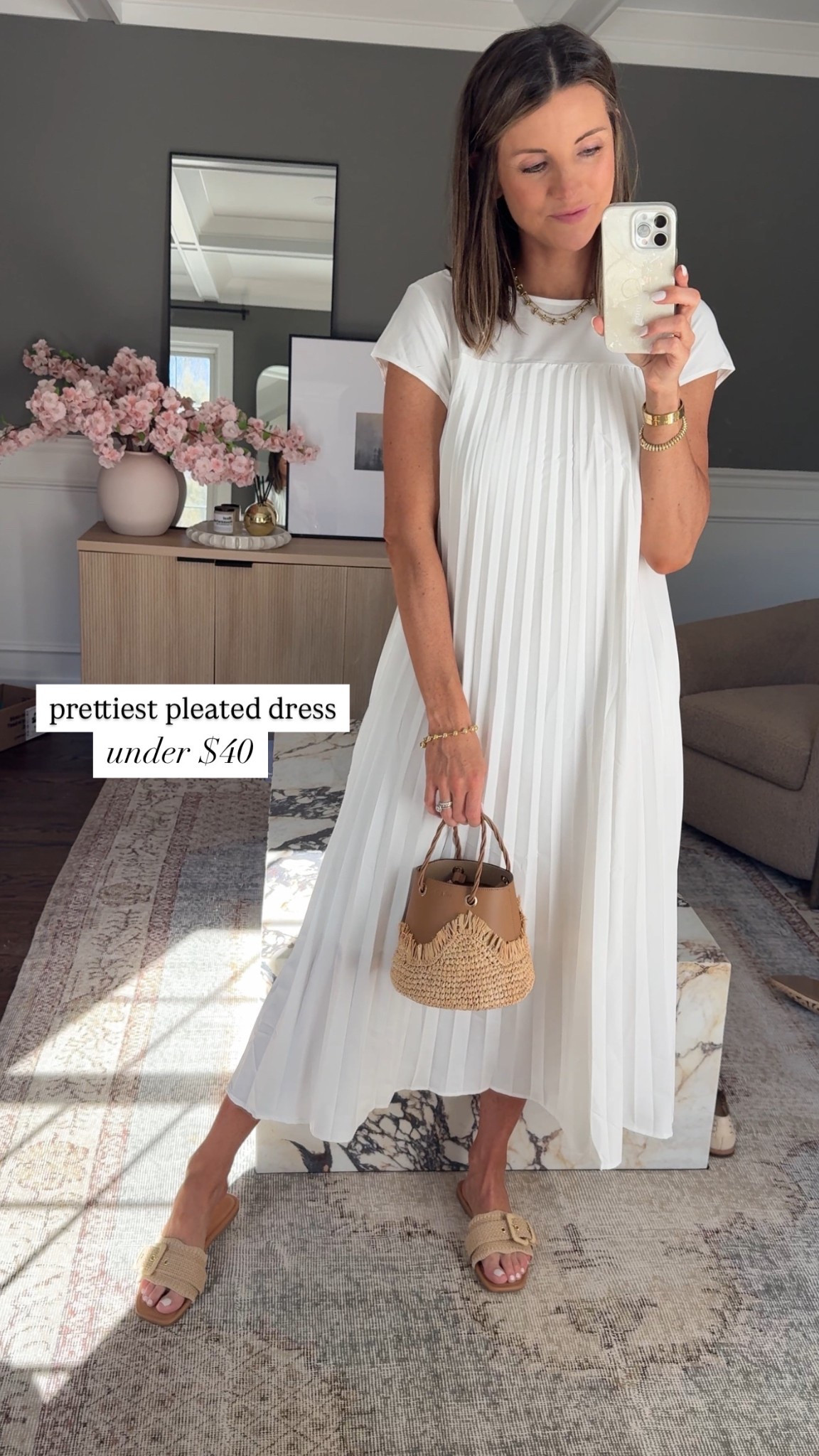 I found this adorable white pleated dress on Amazon, it’s under $40, and comes in multiple colors! Has pockets and the perfect flow. It has a built-in slip so it’s not see-through! This dress would be perfect for a vacation and very easy to dress up or keep casual!

#LTKSeasonal #LTKStyleTip #LTKFindsUnder50