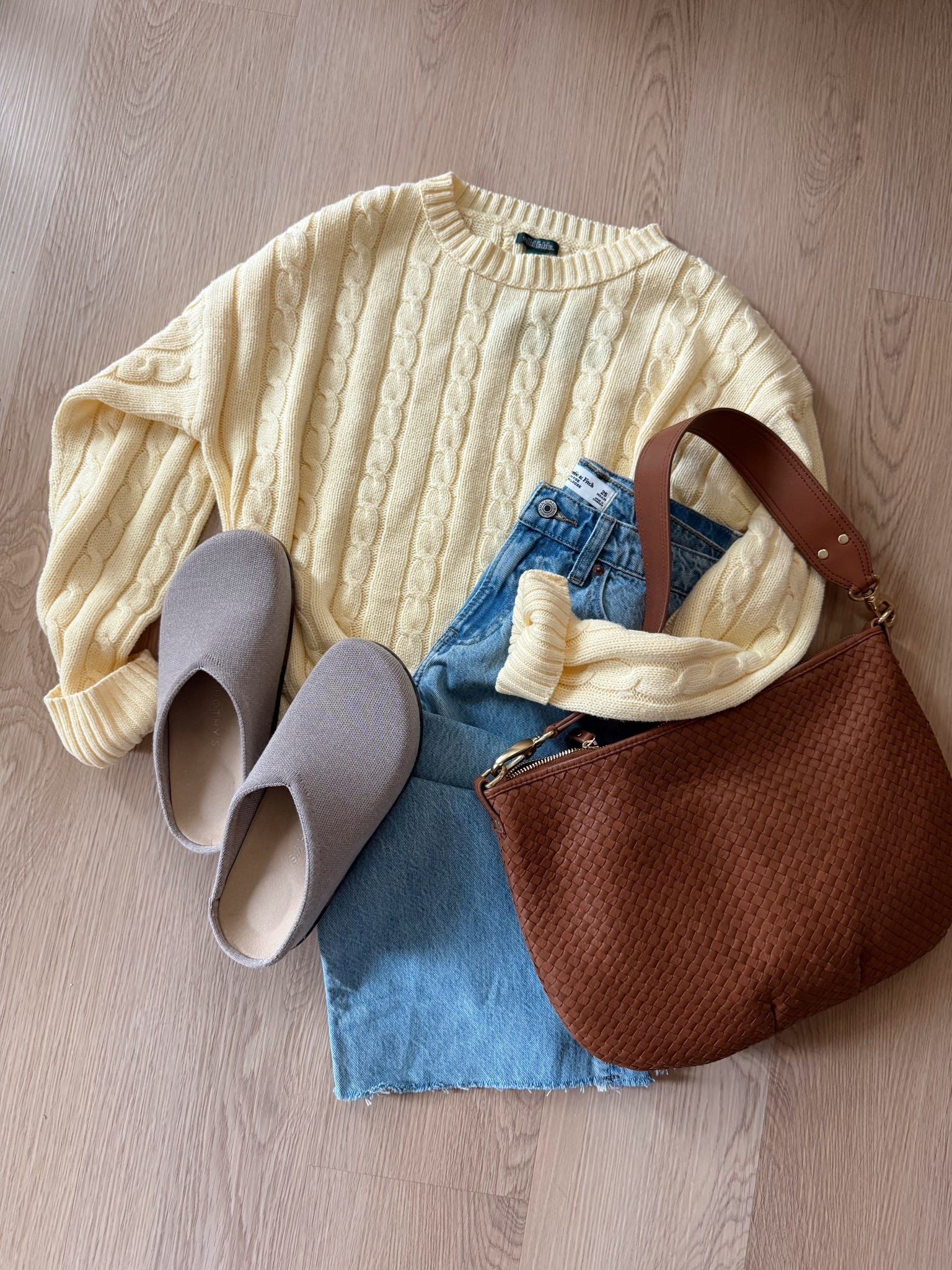 Can’t stop, won’t stop wearing this color 🤭 it is literally giving me life during this dreary winter! This cable knit sweater is so cute and only $30. I sized up two sizes for an oversized fit.

Transition outfit | cable knit sweater | yellow sweater | outfit inspo | Abercrombie denim | Rothy’s | woven bag 

#LTKootd