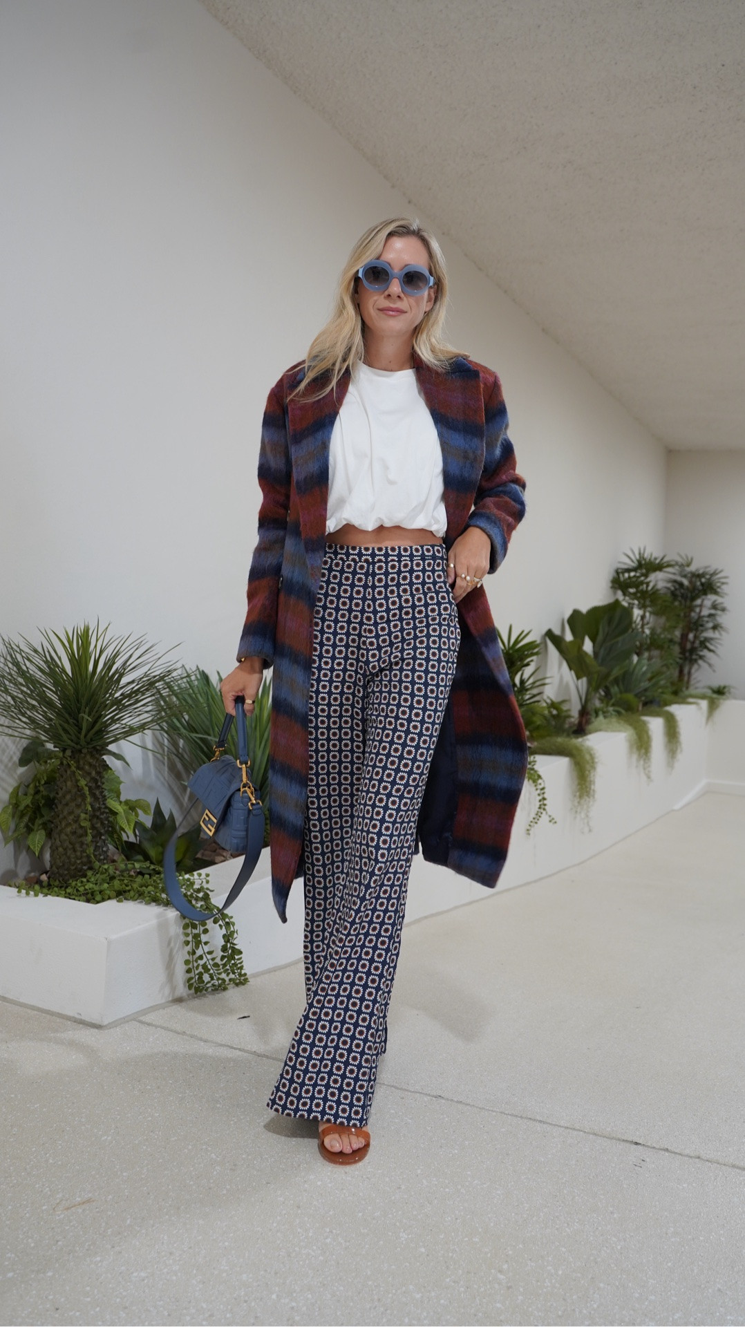 Work outfit today is a simple top and printed pants, and adding in this gorgeous coloured trench coat.

Coat is size 8 but it's currently out of stock so I looked for alternatives
Zara white top size S
Sandro pants size 36
Jimmy Choo jelly sandals size 41
Fendi baguette bag
Tiwi sunnies 

 #LTKaustralia #LTKstyletip

#LTKWorkwear