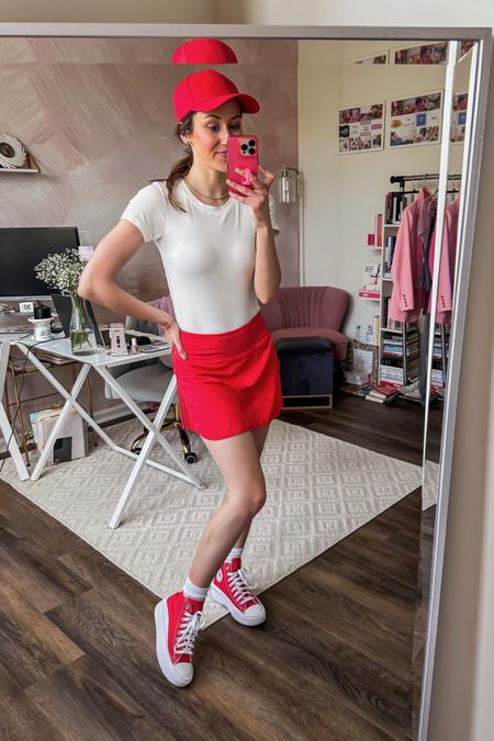 Spring athleisure outfit with Amazon fashion finds ❤️

Red converse sneakers // red baseball hat // white bodysuit // tennis skirt with built in shorts // crew socks 

#LTKfindsunder50 #LTKfitness #LTKstyletip