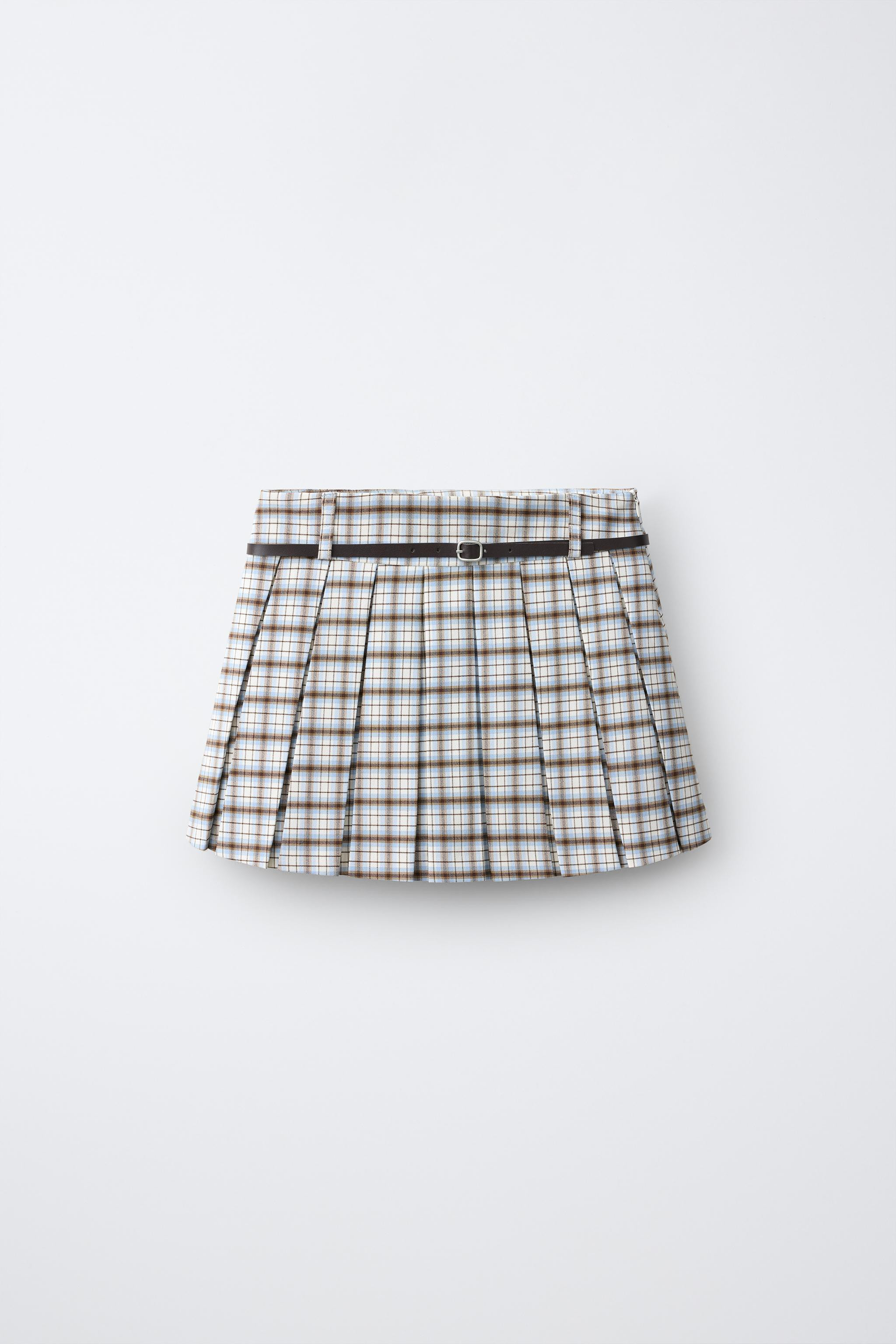 Skirt with interior shorts. Hidden side zip closure. Belt appliqu\u00e9. Pleated detail. Plaid pr... | Zara US