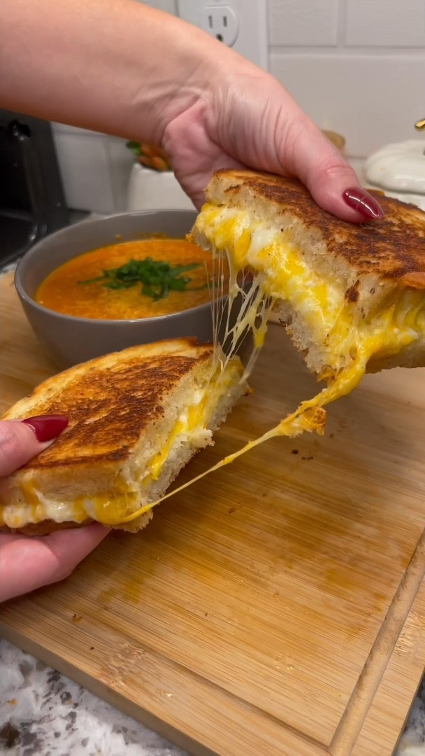 tomato soup & grilled cheese is the ultimate comfort meal🍅🍂the best for when you are craving a cozy dinner!

linked all my kitchen favorites used so you can make it too

Ingredients:
- 1 large yellow onion, roughly chopped
- 1-2 heads garlic, cut in half
- 6 medium globe tomatoes, quartered
- 1 rd bell pepper, roughly chopped
- 1/2 lb cherry tomatoes
- fresh rosemary, about 1 tbsp
- 1-2 tbsp olive oil
- 1 tsp salt, 1 tsp pepper
*roast at 350°F for about 1 hour
- 2 tbsp tomato paste
- 3 cups chicken broth
- 1 tsp thyme
- 2 tbsp fresh basil
- 1 tsp worcestershire sauce
- 2 tbsp white sugar
*blend together until smooth
- 1/2 cup heavy cream
*top with
- fresh basil
- parmesan cheese, freshly grated

grilled cheese🧀🥖
- cracked wheat sourdough
- mayo, parmesan, black pepper
- pepperjack cheese, freshly grated
- cheddar cheese, greshly grated
- mozzarella cheese

#LTKHome #LTKSeasonal #LTKFamily