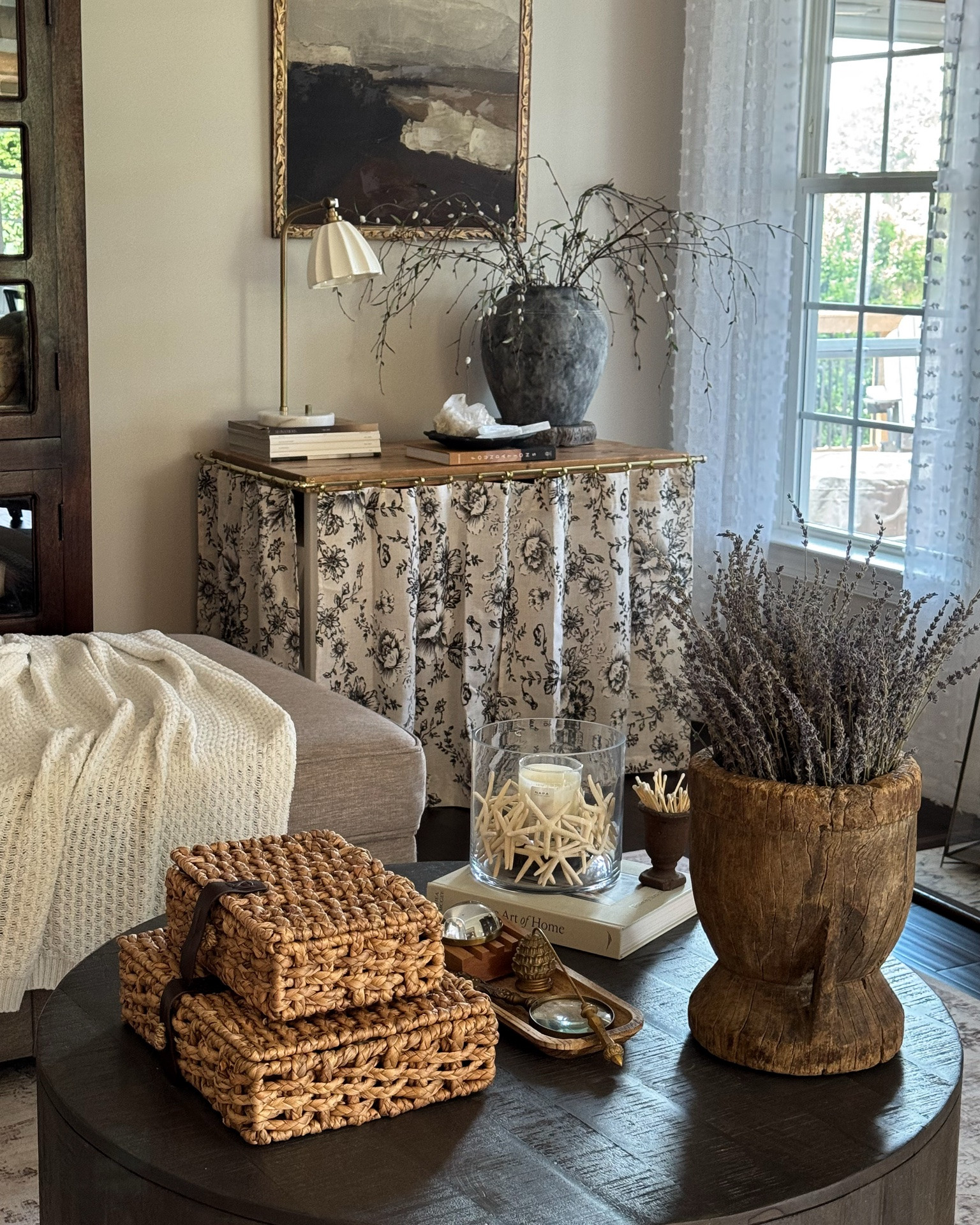 Loving this new European Cottage look for my table!! This look could also be replicated on a bookshelf🥰

I had this table custom made to fit over my dog crate.

Floral cafe curtains, brass curtain rods, gold cafe rings, coffee table book, pussy Willow stems, selenite sticks, stone pedestal, round coffee table, vintage mortar, lavender, glass cylinder, starfish, mini vintage urn, matches, wood tray, magnifying glass, pineapple snuffer

#LTKSeasonal #LTKstorytime #LTKHome