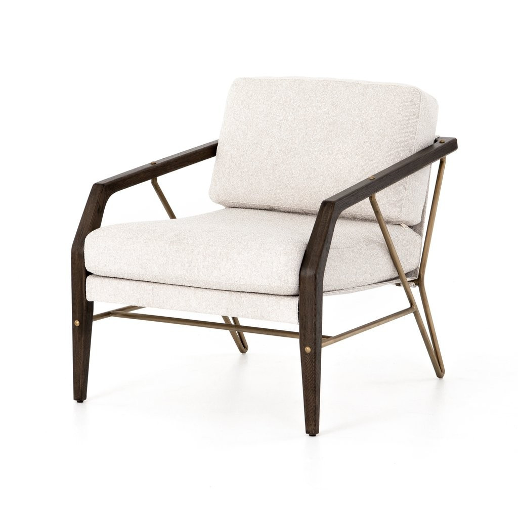 Architectural influence rules this new take on a mid-century form. Sling-style seating is upholst... | Burke Decor