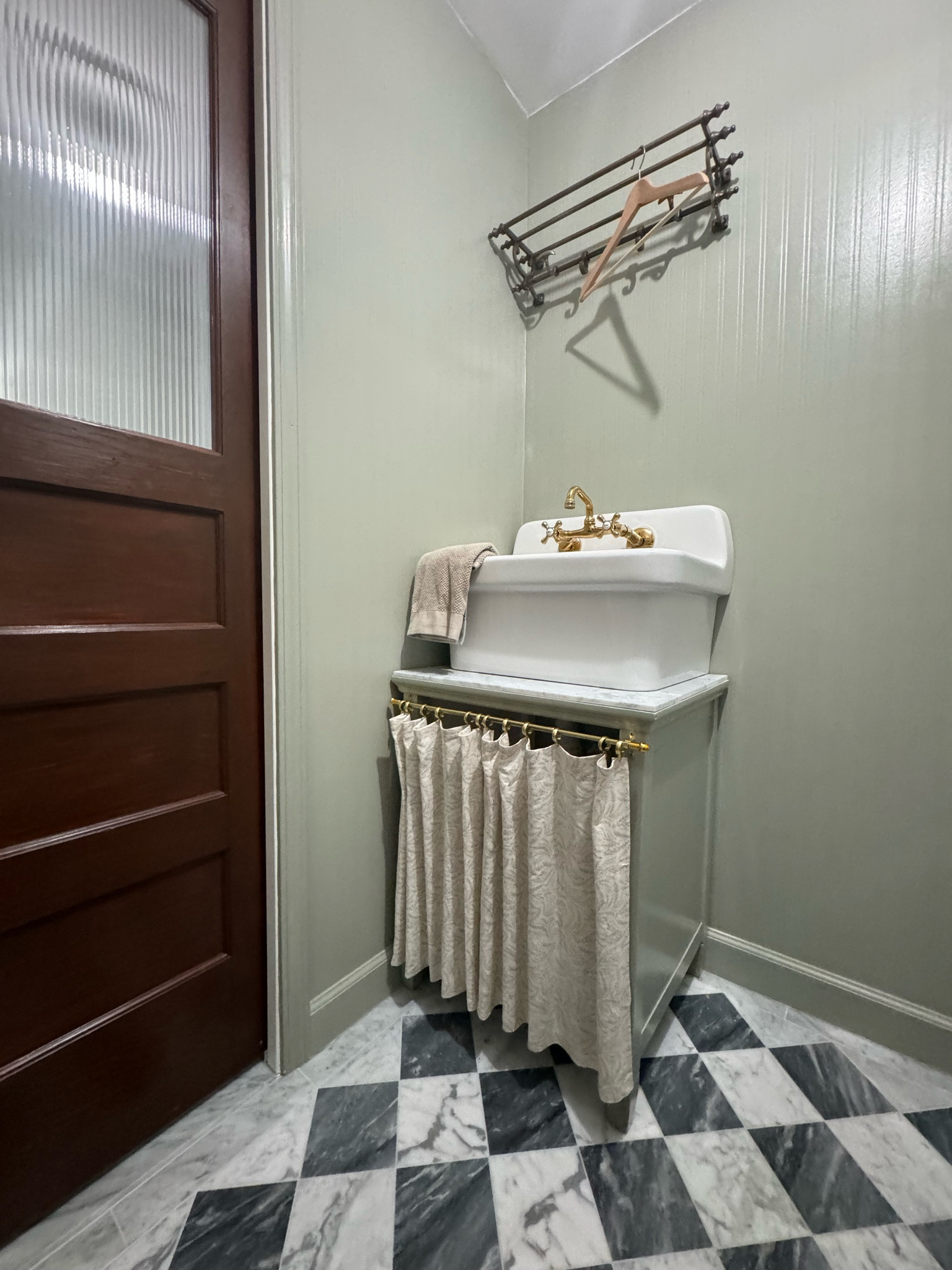 Laundry utility sink, cafe curtain, and metal hanging rack on marble checkered floors  

#LTKSaleAlert #LTKFindsUnder50 #LTKHome